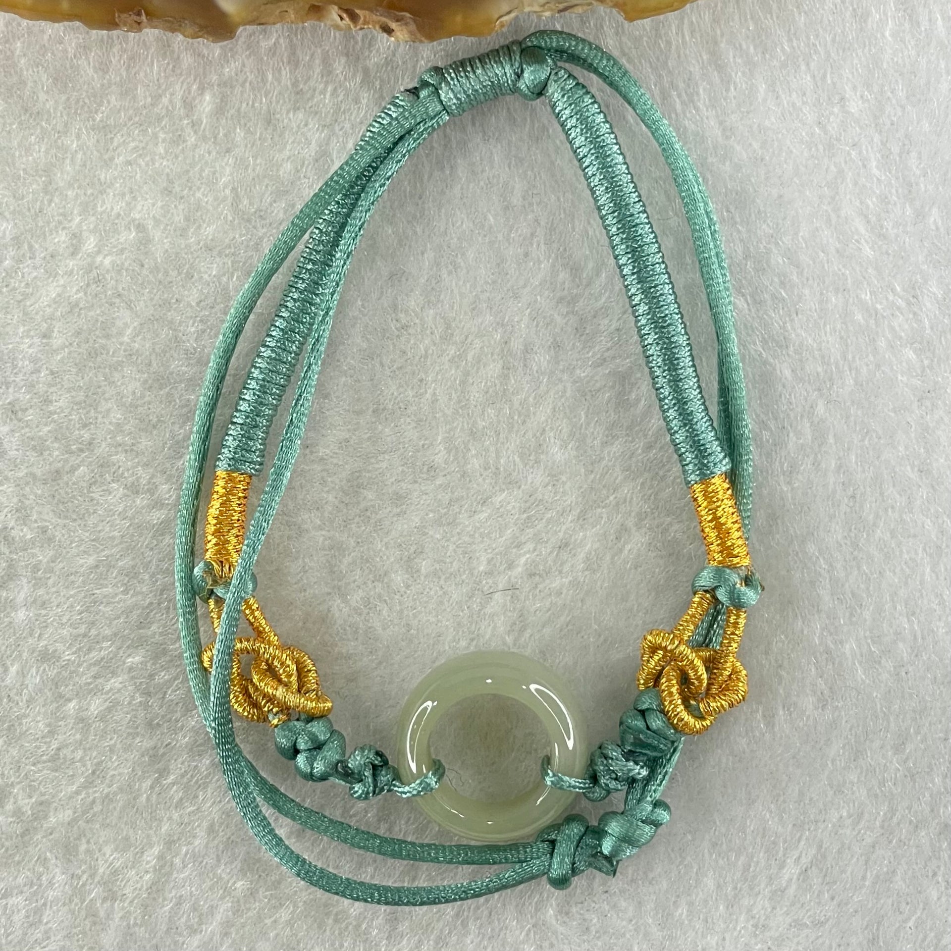 Type A Blueish Green Jadeite Ping An Kou String Bracelet 2.83g 14.4 by 6.3mm - Huangs Jadeite and Jewelry Pte Ltd