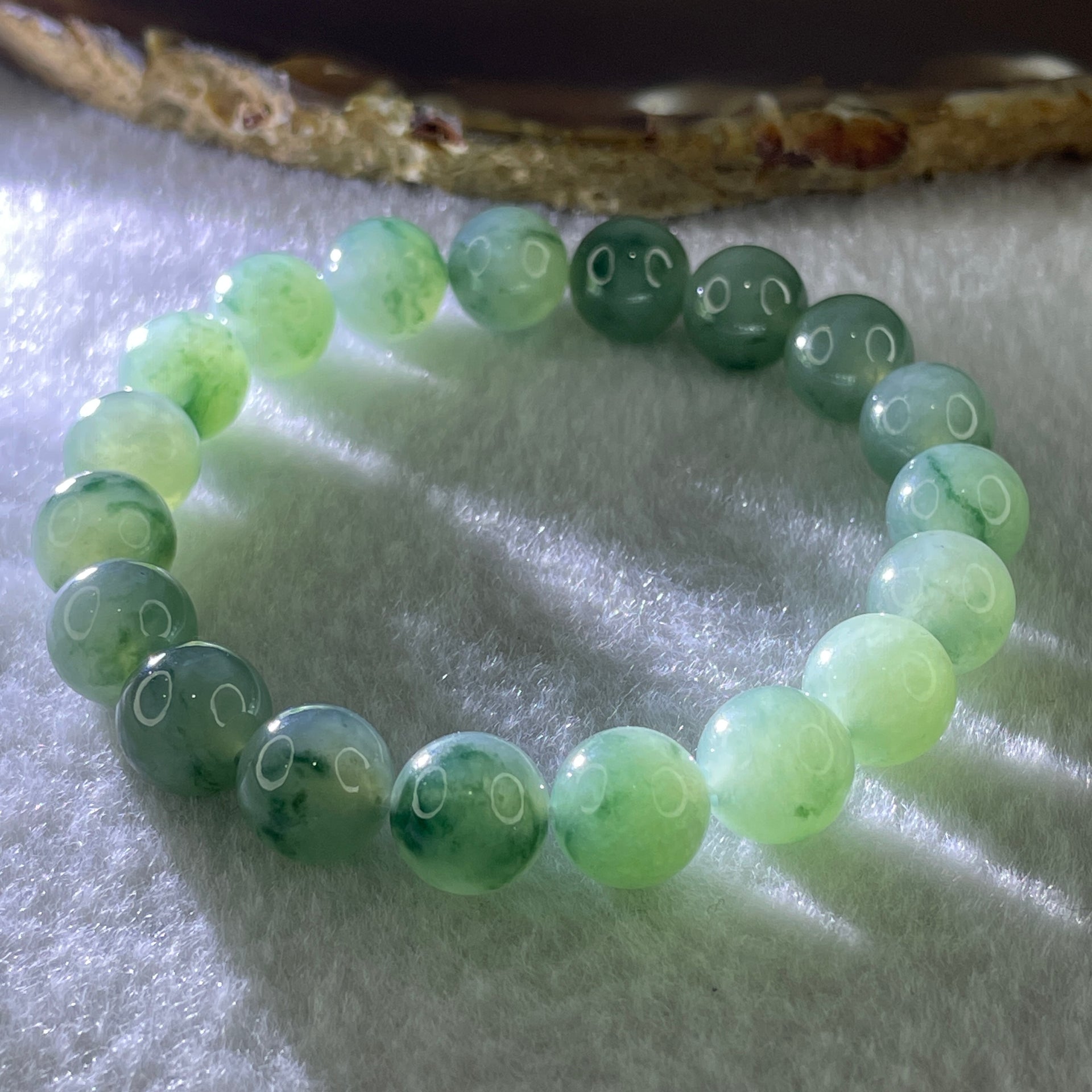Tye A Natural Jelly Semi Icy Green with Dark Green Piao Hua Jadeite Beads Bracelet 28.75g 14.5cm 9.6mm 19 Beads - Huangs Jadeite and Jewelry Pte Ltd