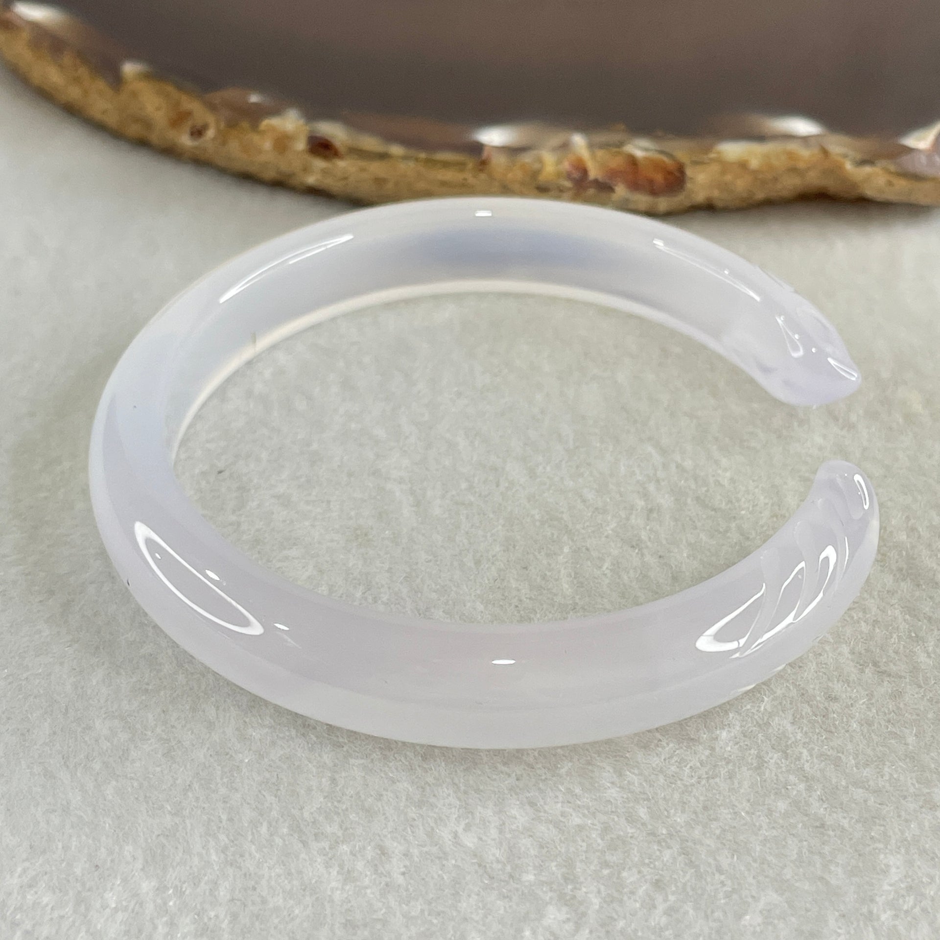 Natural Pinky Agate Fox Bange Internal Dimeter 57.3mm 26.43g 10.2 by 7.6mm - Huangs Jadeite and Jewelry Pte Ltd