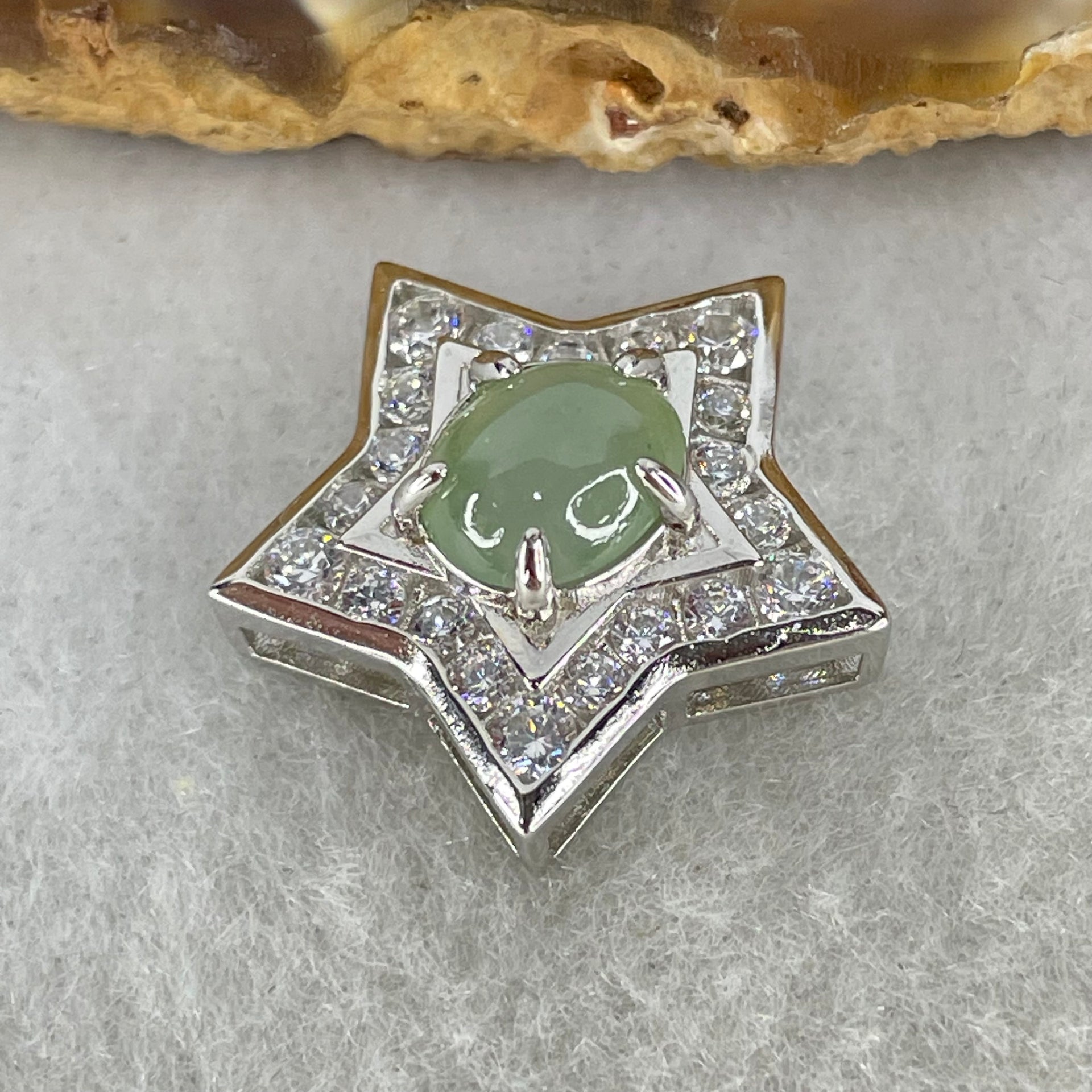 Type A Semi Icy Blueish Green Cabochon Jadeite in S925 Sliver Star with Crystal Charm 2.36g 7.4 by 6.5 by 3.0mm - Huangs Jadeite and Jewelry Pte Ltd