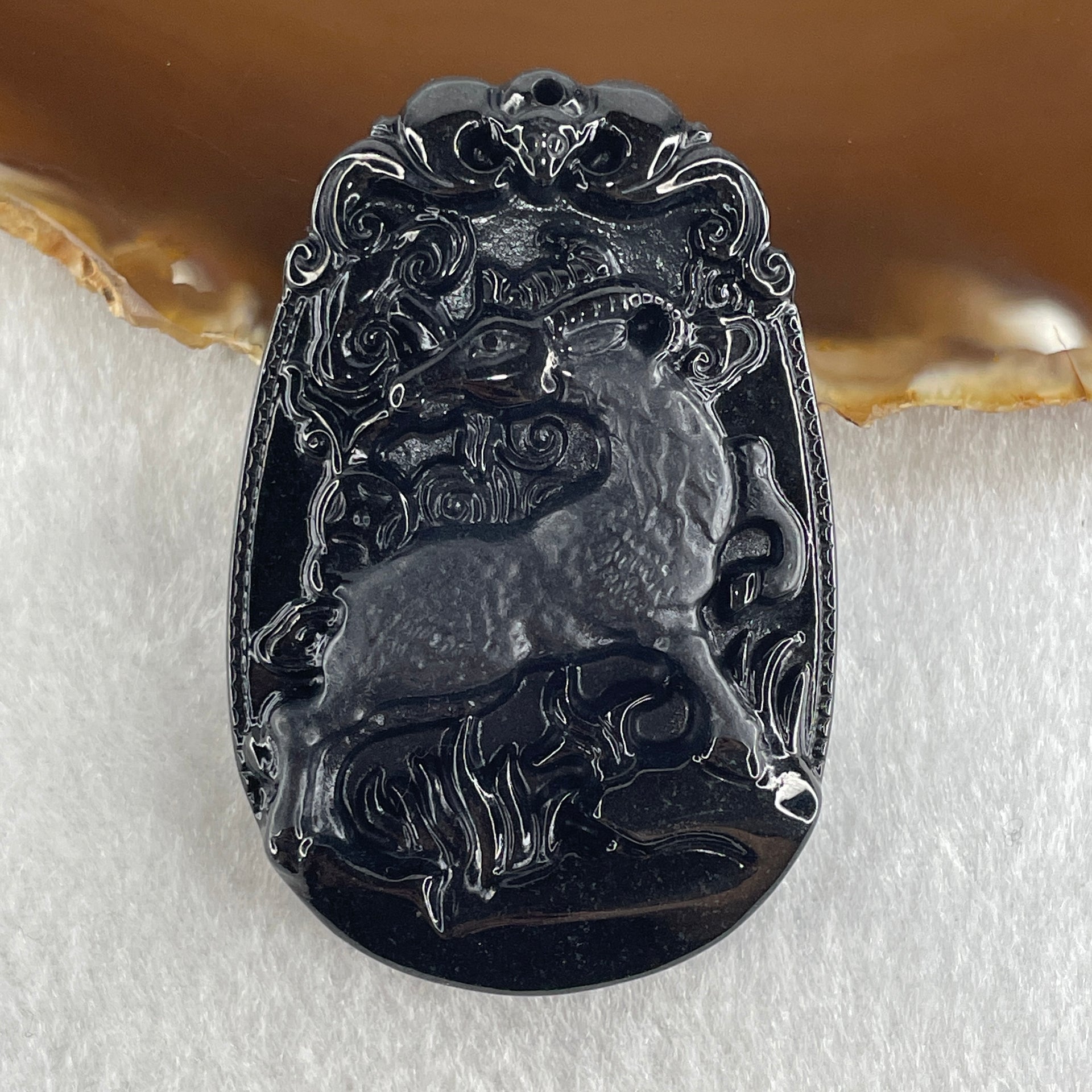 Type A Opaque to Partial Translucent Black Omphacite Jadeite Goat Pendant 27.85g 59.9 by 40.6 by 9.8mm - Huangs Jadeite and Jewelry Pte Ltd