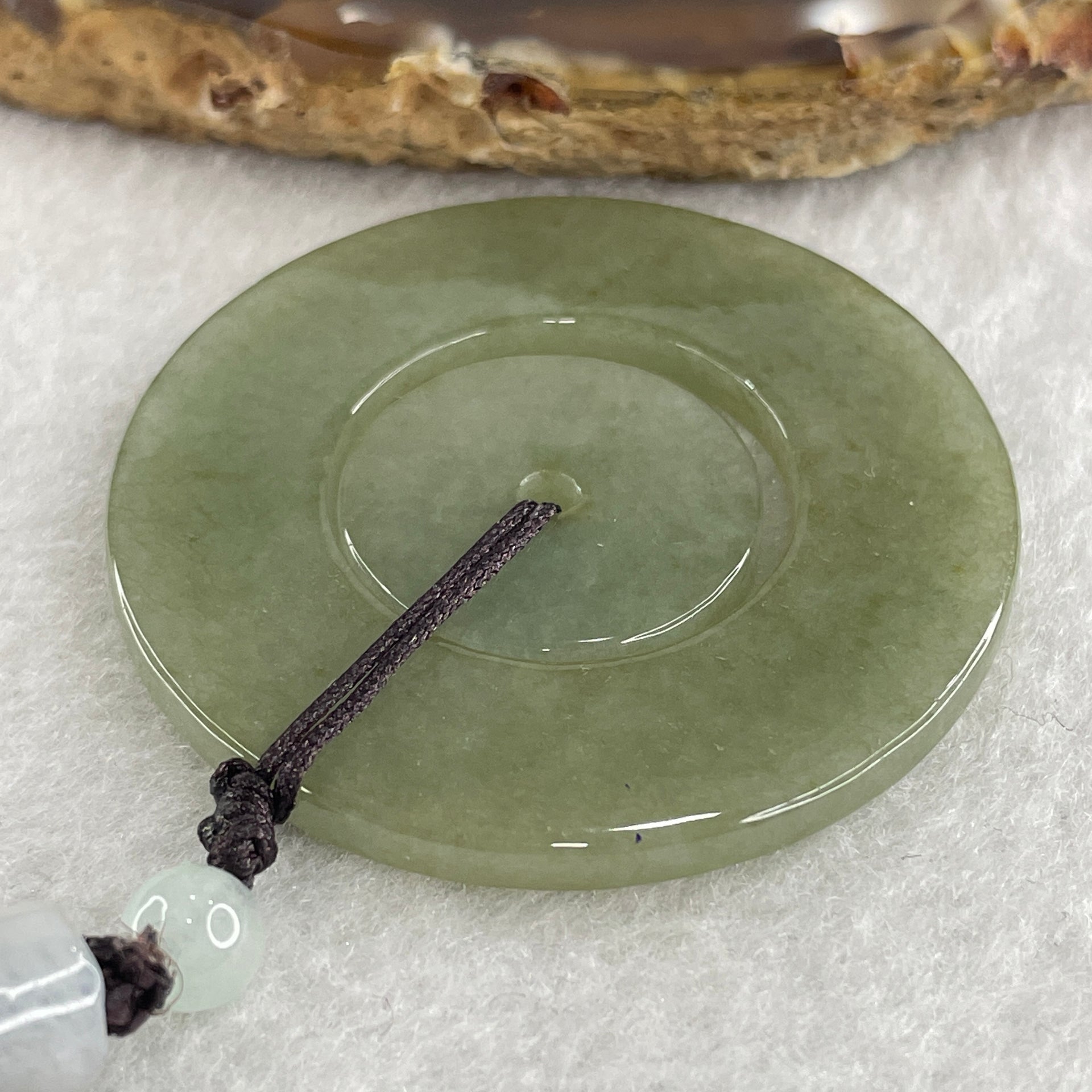Natural Type A Green with Brownish Jadeite Double Ping An Kou Donut Pendant 20.64g 44.9 by 3.4mm - Huangs Jadeite and Jewelry Pte Ltd