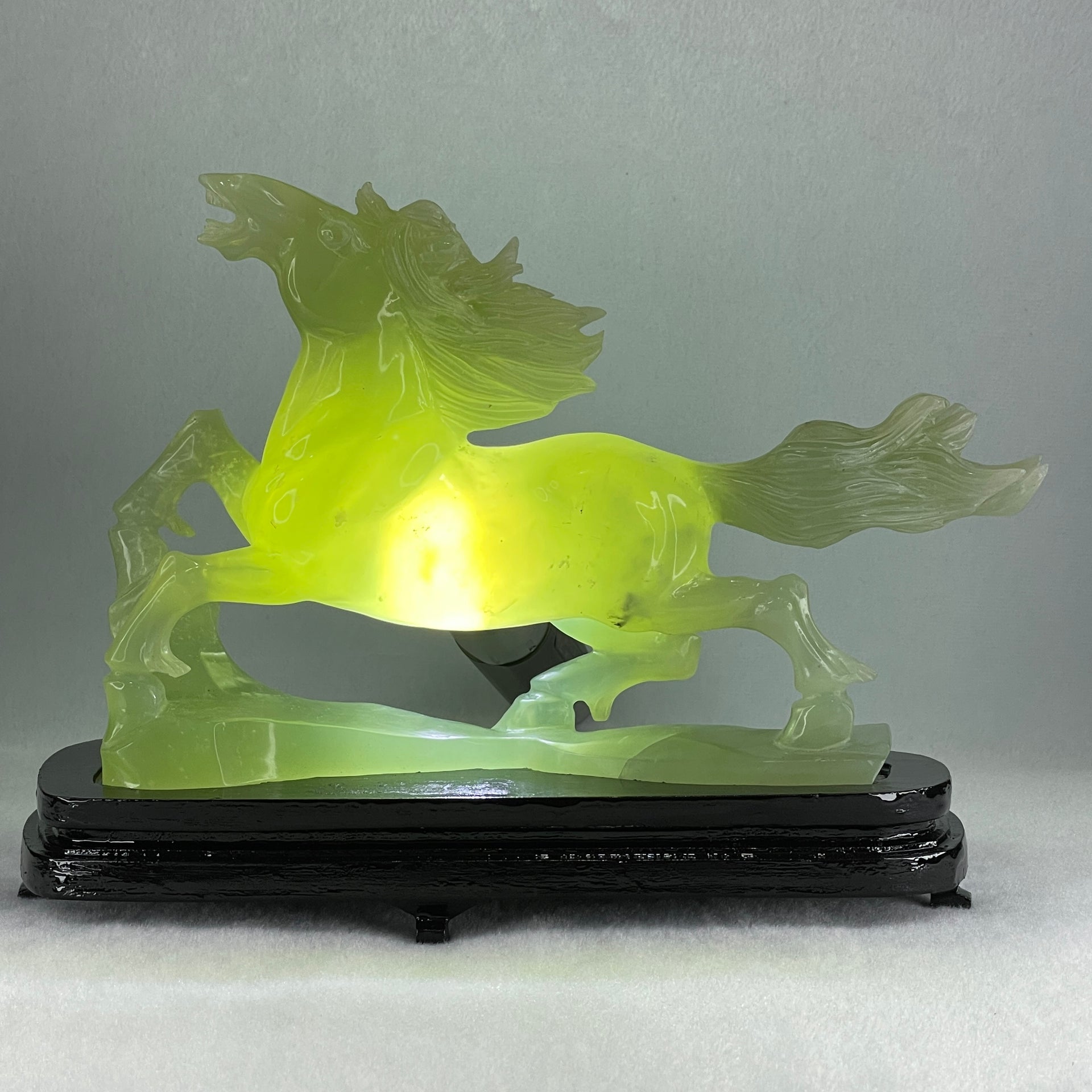 Natural Light Green Serpentine Victory Horse with Wooden Stand Display 1,274.6g 255.0 by 90.0 by 183.0mm - Huangs Jadeite and Jewelry Pte Ltd