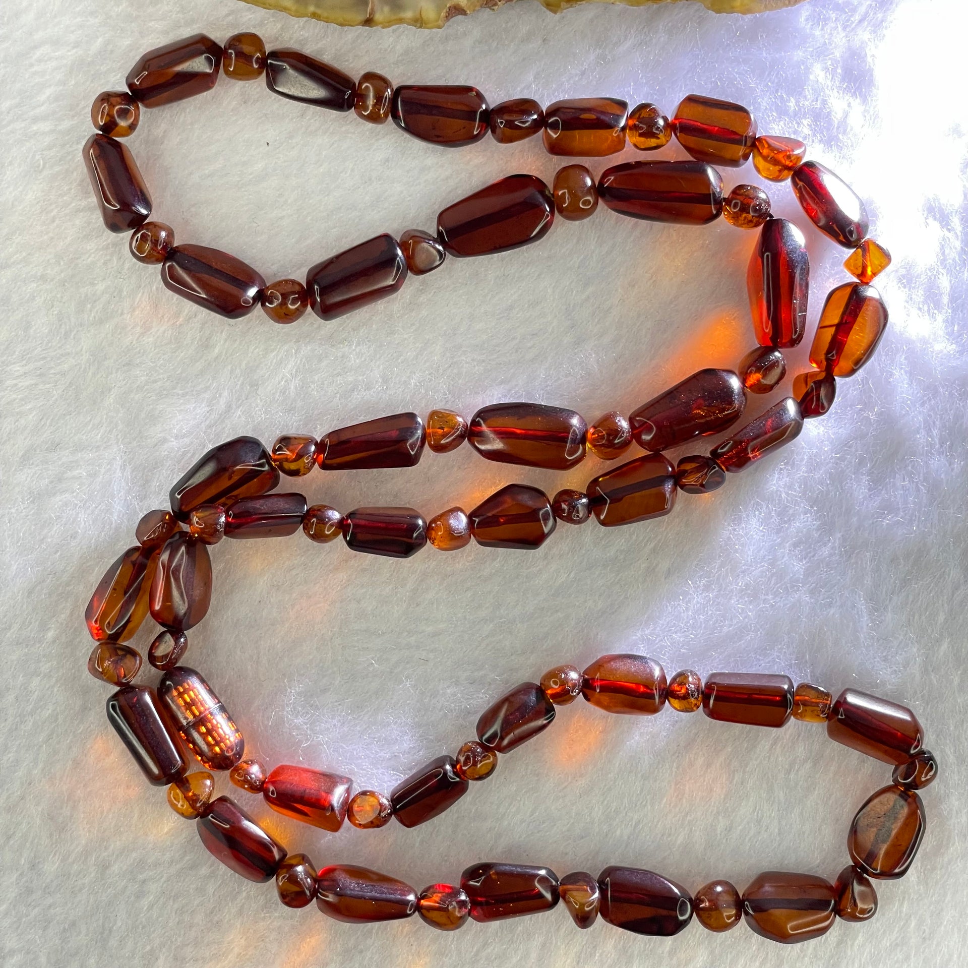 Natural Tea Color Blood Amber Irregular Beads Necklace 天然茶色血珀项链 14.99g 10.3 by 6.5 by 5.2mm 37pcs - Huangs Jadeite and Jewelry Pte Ltd
