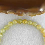 Natural Type A Semi Icy Yellowish Jadeite Beads Bracelet | (17.72g | 19.5cm | 6.8mm x 28 Beads | Solar Plexus & Root Chakra Synergy, "Huang Fei" Abundance Catalyst & Feng Shui Wealth Anchor) - Huangs Jadeite and Jewelry Pte Ltd