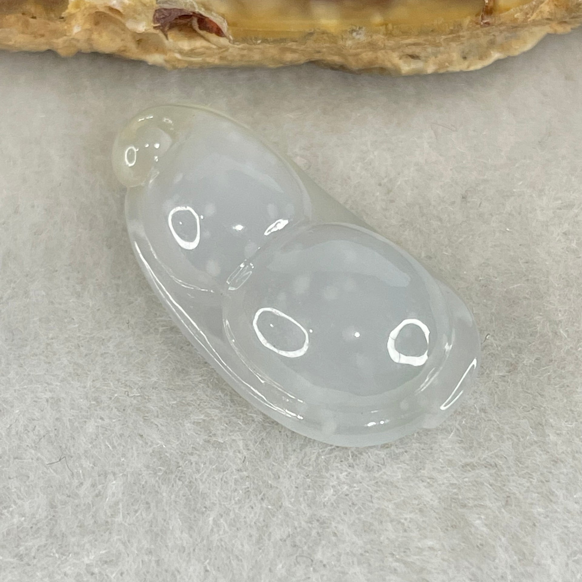 Type A Semi Icy Faint Green with Muna Jadeite Peapod Pendant 4.13g 28.0 by 13.2 by 7.4mm - Huangs Jadeite and Jewelry Pte Ltd