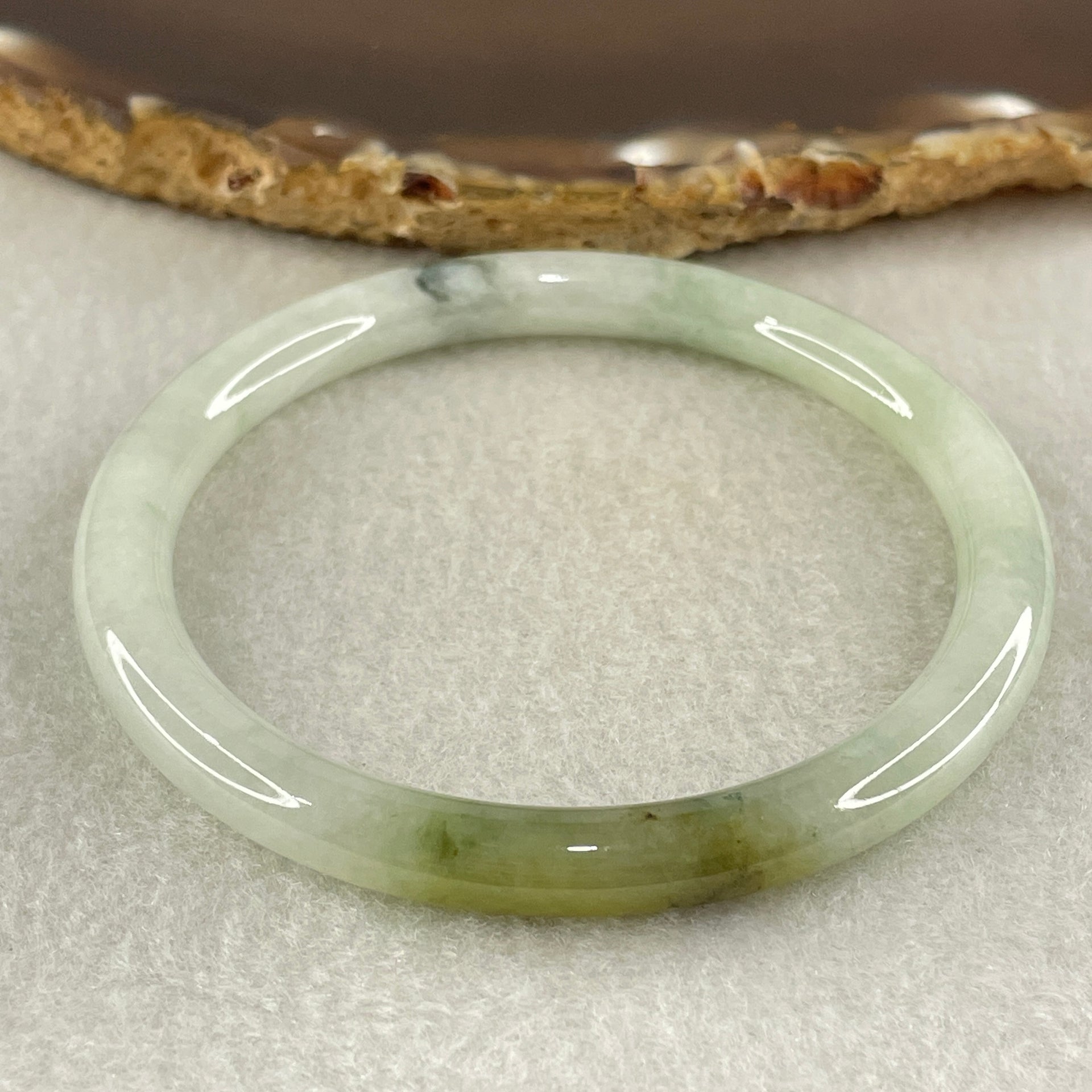 Type A Blueish Green with Brownish Piao Hua Jadeite Bangle Internal Diameter 56.1mm 23.86g 6.7 by 6.9m (Slight Internal Lines) - Huangs Jadeite and Jewelry Pte Ltd