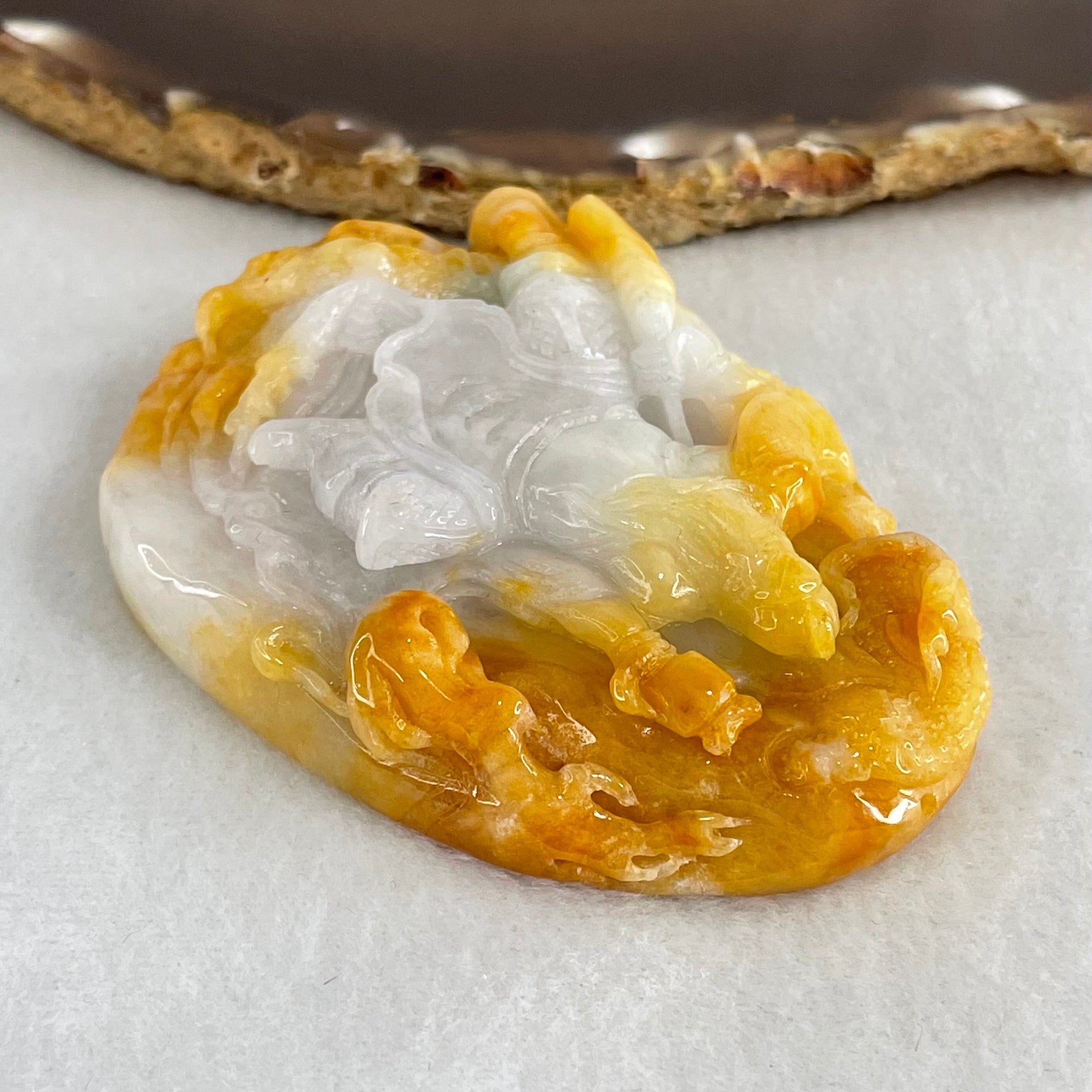 Type A Yellow with Faint Lavender Green Jadeite Guan Gong with Double Dragons 116.28g 75.0 by 54.0 by 16.8mm (Burned) - Huangs Jadeite and Jewelry Pte Ltd