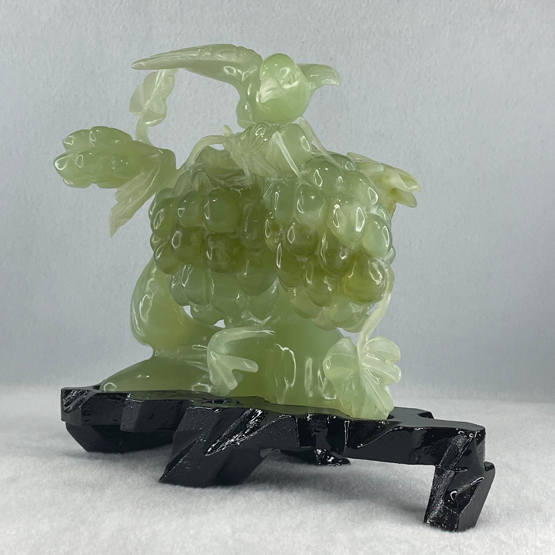 Natural Green Serpentine Magpie Bird with Cricket on Grape with Wooden Stand Display 1,042.7g L195.0 by B105.0 by H180.0 mm - Huangs Jadeite and Jewelry Pte Ltd