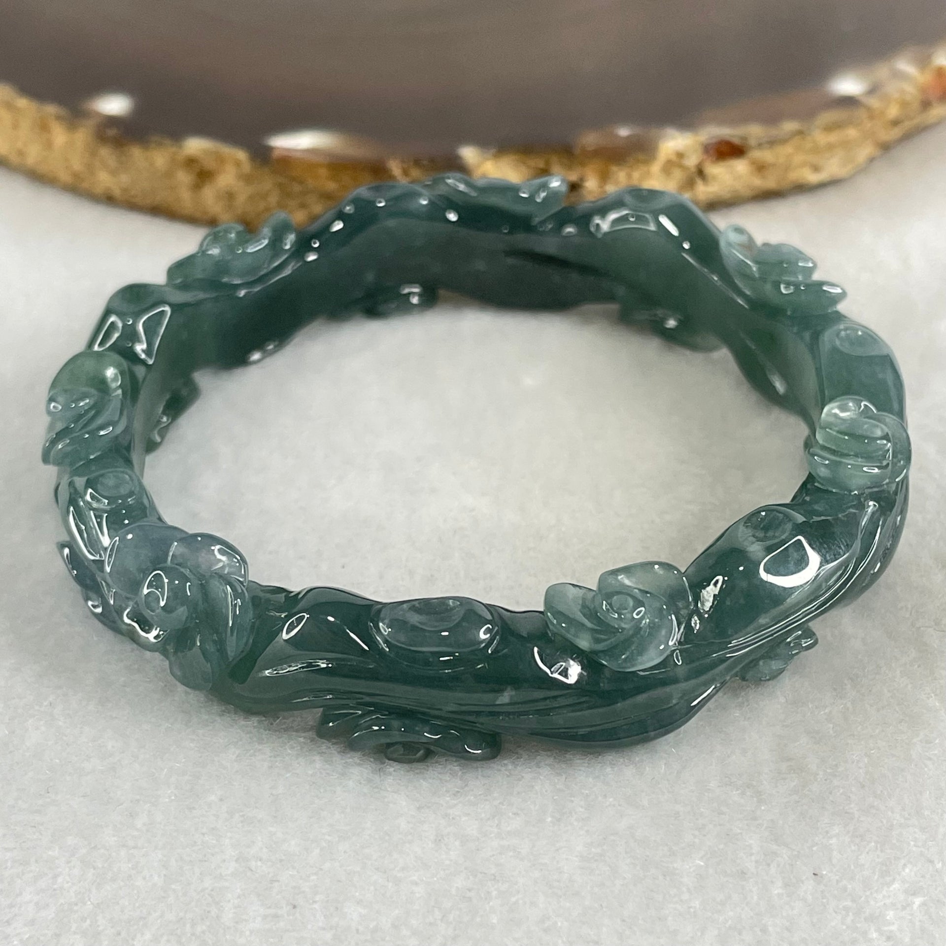 Type A Blueish Green Jadeite with Flowers Bangle 45.62g Inner Diameter 57.2mm 13.8 by 8.0mm - Huangs Jadeite and Jewelry Pte Ltd