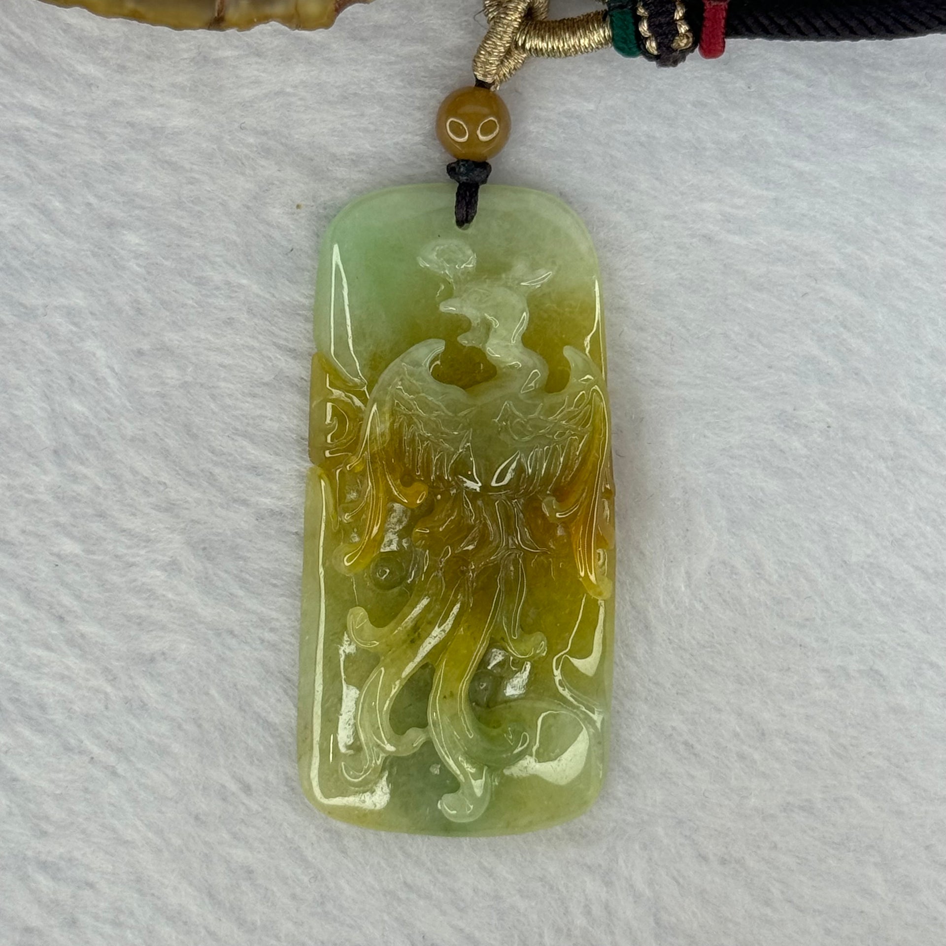 Type A Yellow and Light Green Jadeite Phoenix Pendent 20.73g 50.8 by 24.6 by 7.7mm - Huangs Jadeite and Jewelry Pte Ltd