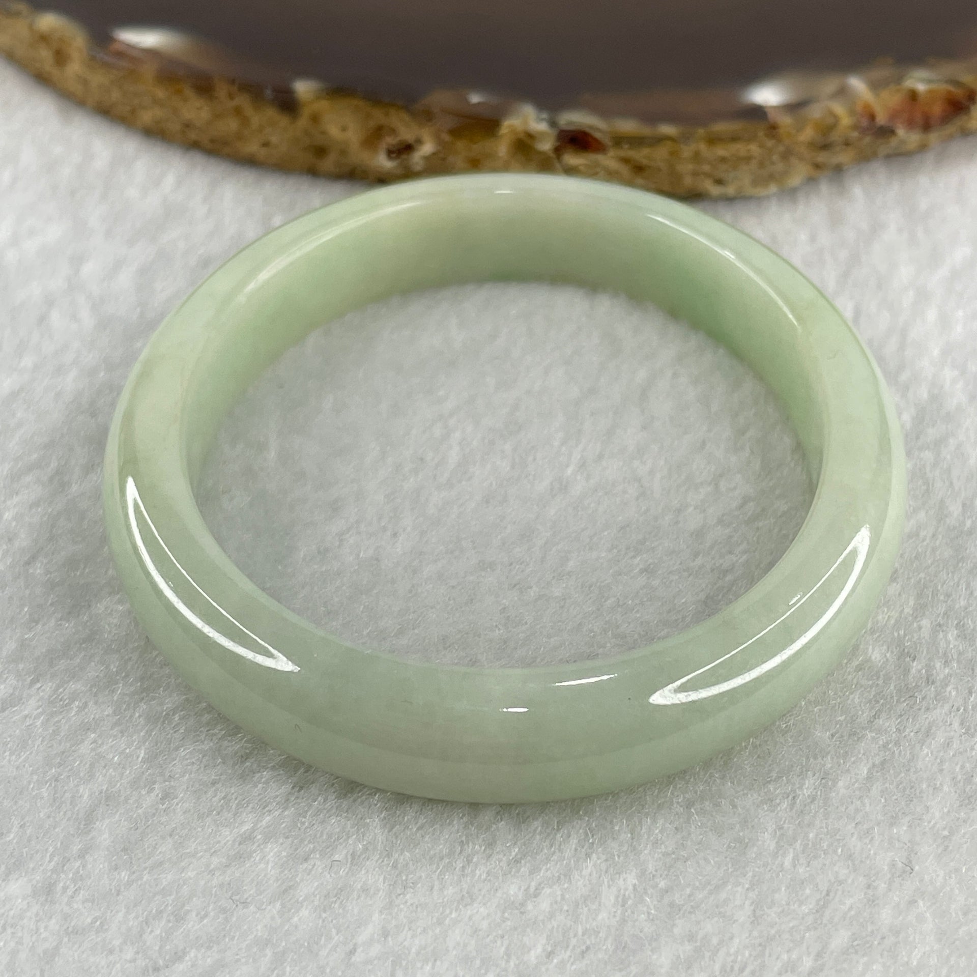 Natural Type A Light Apple Green Jadeite Oval Bangle 32.89g Inner Diameter 55.1mm Thickness 9.9 by 6.8mm (Close to Perfect) - Huangs Jadeite and Jewelry Pte Ltd