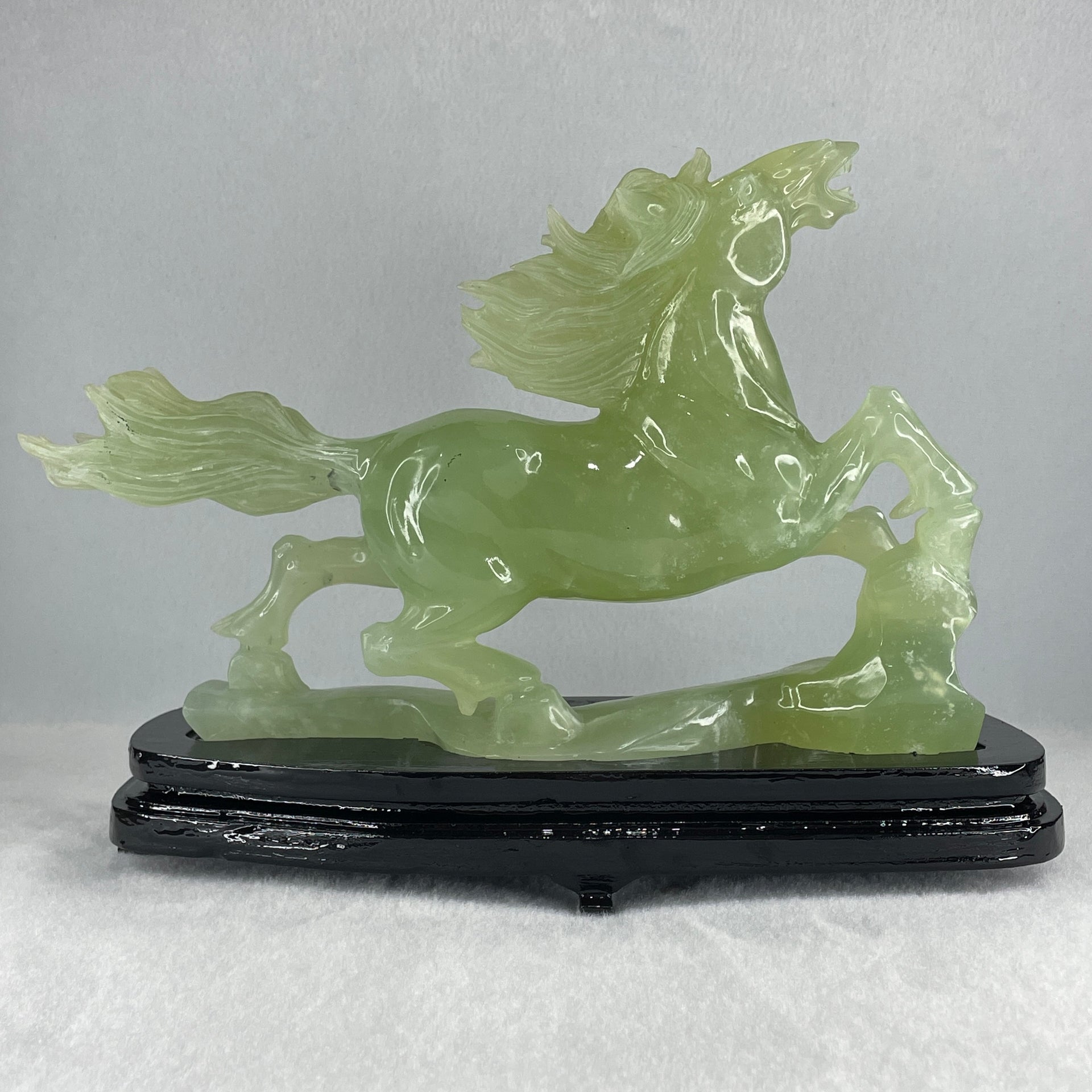 Natural Light Green Serpentine Victory Horse with Wooden Stand Display 1,274.6g 255.0 by 90.0 by 183.0mm - Huangs Jadeite and Jewelry Pte Ltd