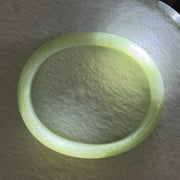 Type A Light Apple Green Jadeite Oval Bangle 33.35g Internal Diameter 52.3mm 12.2 by 6.5mm (Very Slight Fine Internal Lines) - Huangs Jadeite and Jewelry Pte Ltd