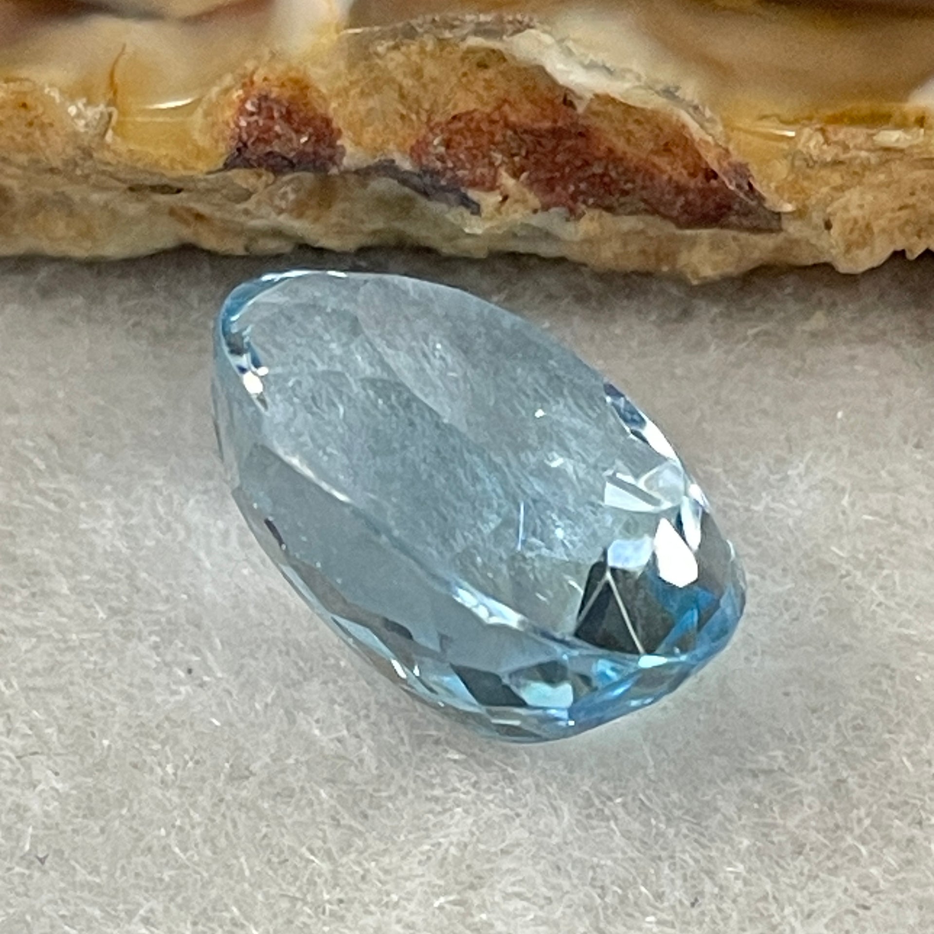 Natural Sky Blue Topaz Oval Shape 12.31ct 14.8 by 12.0 by 8.1mm - Huangs Jadeite and Jewelry Pte Ltd