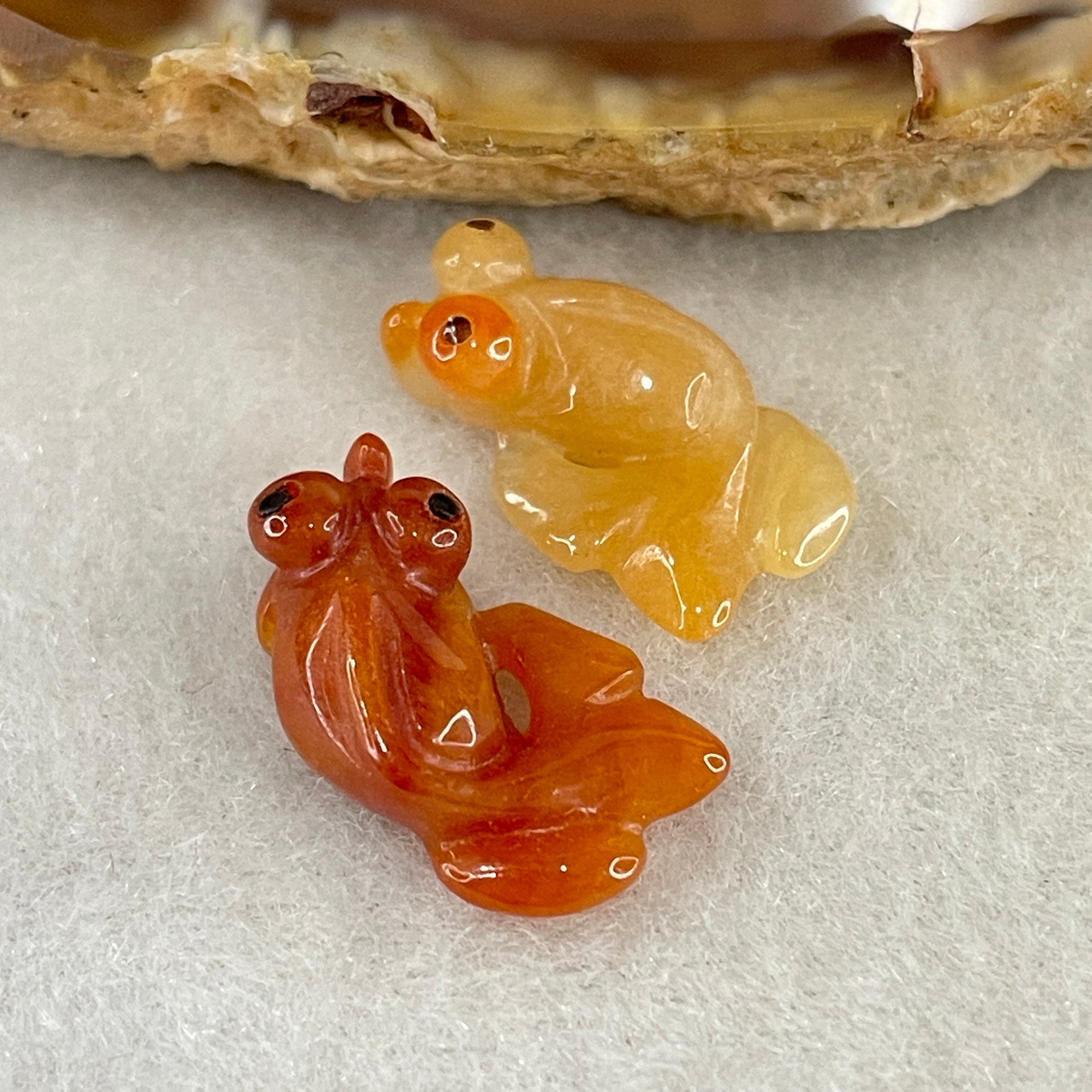 Natural Type A Yellow and Red Jadeite Pair Gold Fish Charm each 0.97g 16.9 by 9.4 by 5.5mm and 1.21g 17.0 by 9.8 by 5.7mm - Huangs Jadeite and Jewelry Pte Ltd