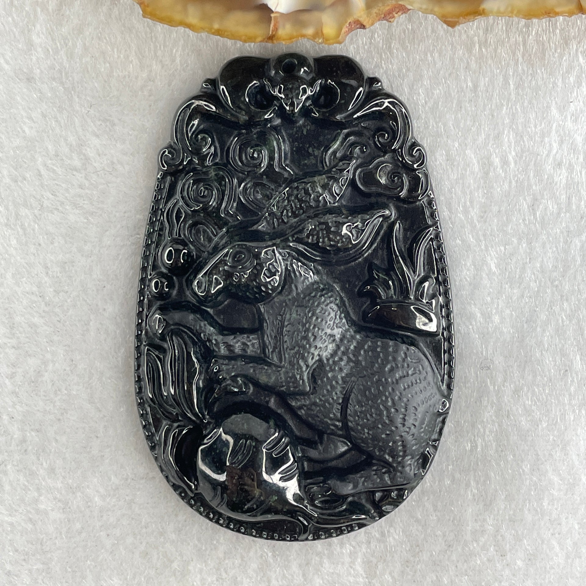 Type A Opaque to Partial Translucent Black Omphacite Jadeite Rabbit Pendant 25.89g 60.2 by 39.8 by 8.9mm - Huangs Jadeite and Jewelry Pte Ltd