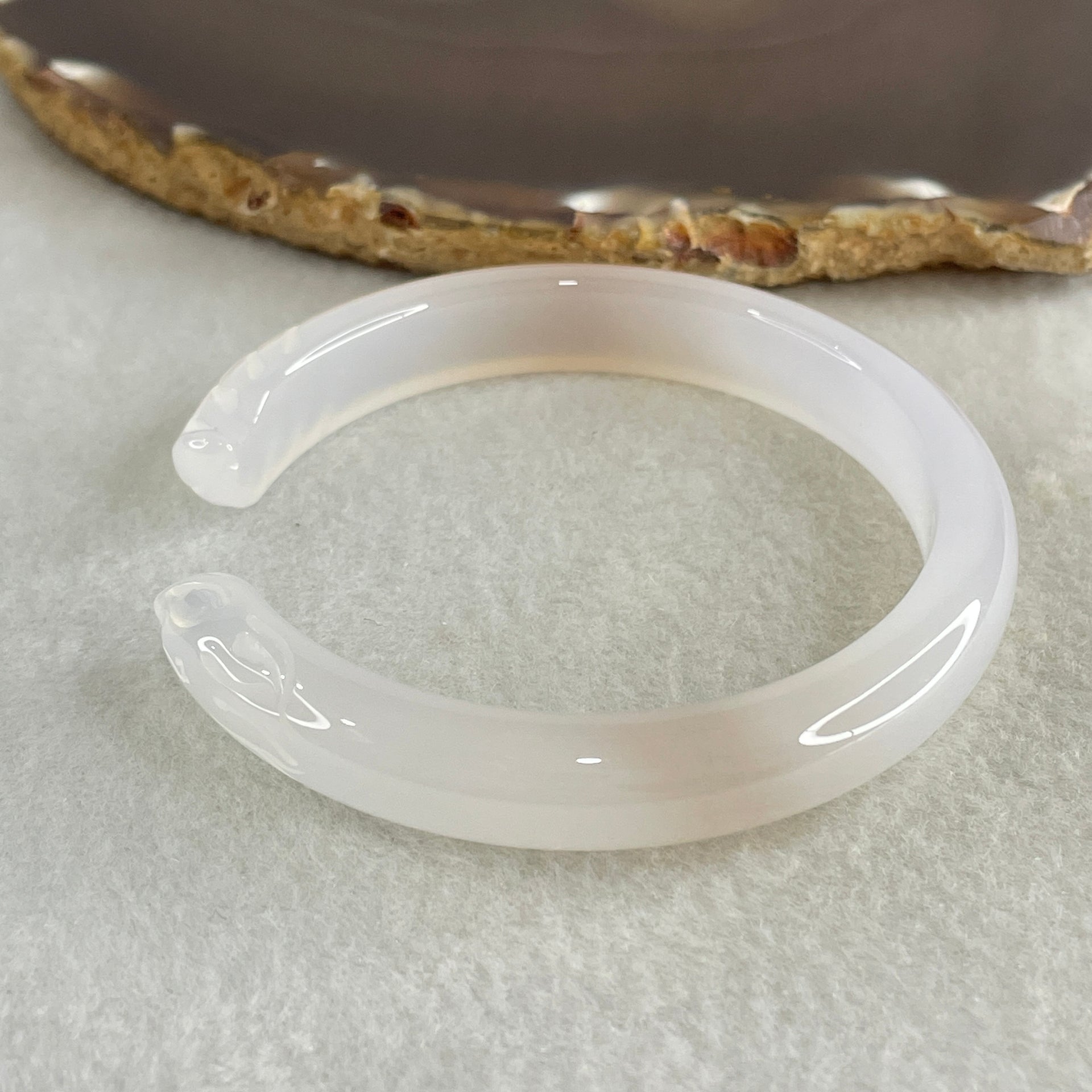 Natural Pinky Agate Fox Bange Internal Dimeter 56.4mm 27.67g 10.2 by 6.9mm - Huangs Jadeite and Jewelry Pte Ltd