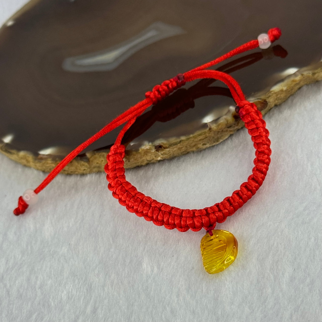 Natural Golden Yellow Amber Comb Charm in Red String Bracelet 2.57g Adjustable Size 17.1 by 11.5 by 3.3mm - Huangs Jadeite and Jewelry Pte Ltd