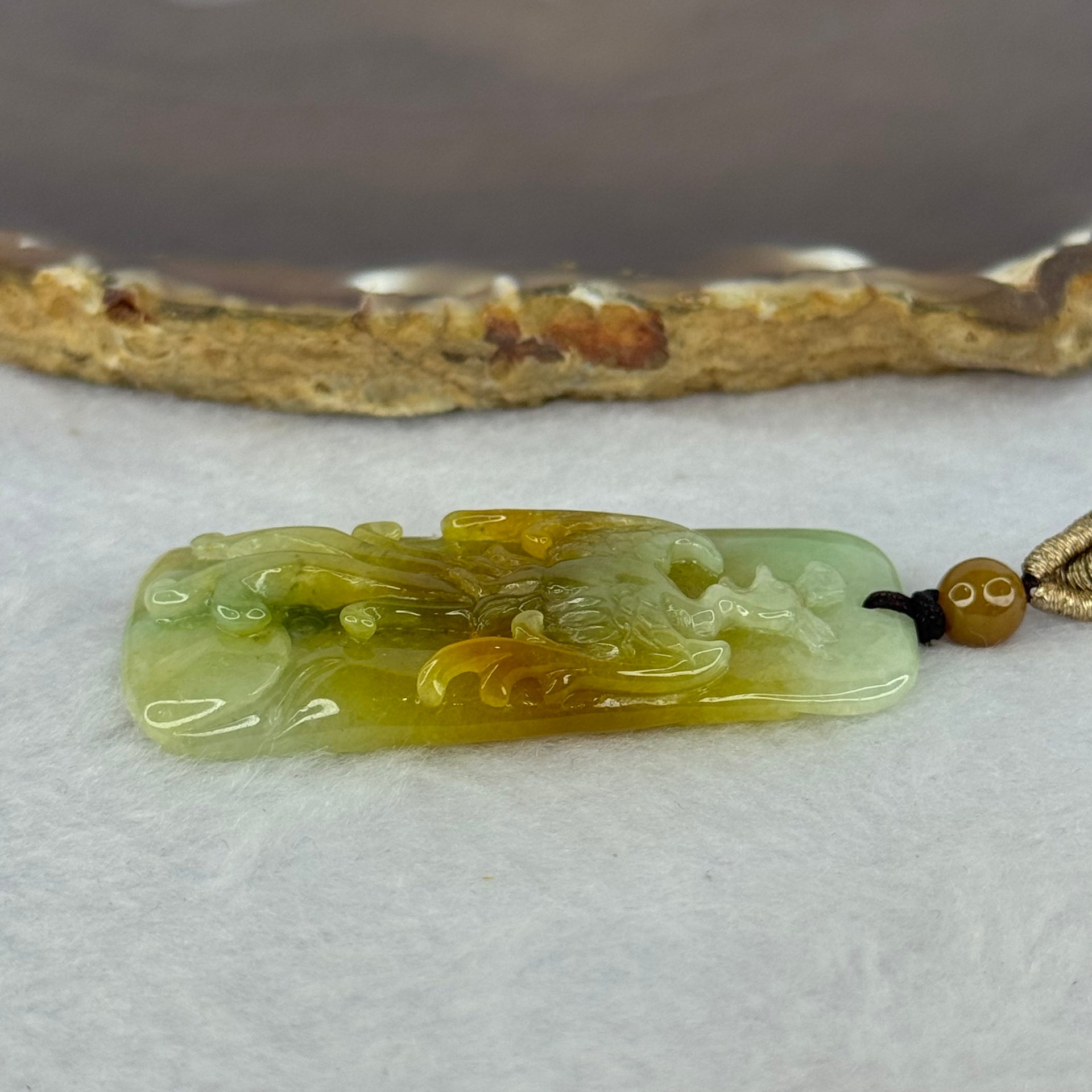 Type A Yellow and Light Green Jadeite Phoenix Pendent 20.73g 50.8 by 24.6 by 7.7mm - Huangs Jadeite and Jewelry Pte Ltd