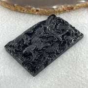 Type A Opaque to Partial Translucent Black Omphacite Jadeite Guan Yin with Dragon and Phoenix Pendant 34.30g 63.1 by 41.4 by 8.0mm - Huangs Jadeite and Jewelry Pte Ltd