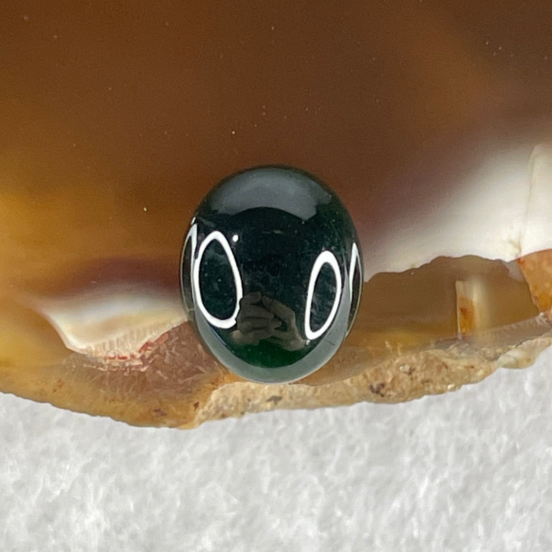 Type A Translucent Black Omphacite Jadeite Oval Cabouchon Stone For Setting 0.34g 8.2 by 6.9 by 3.0mm - Huangs Jadeite and Jewelry Pte Ltd