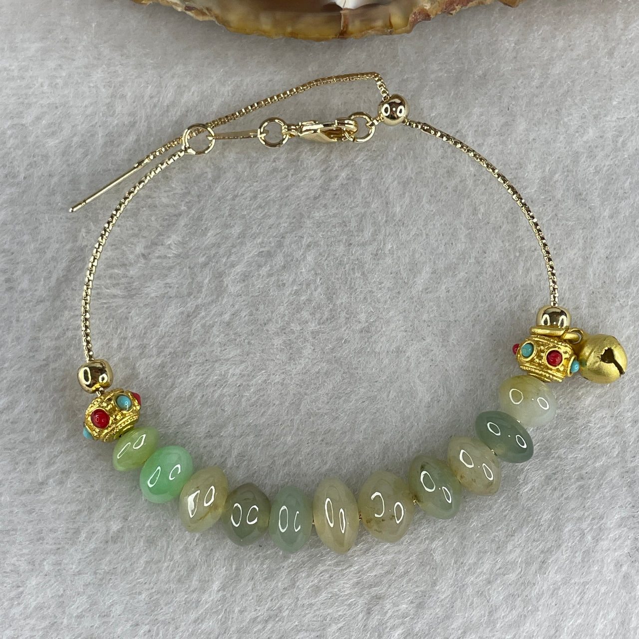 Natural Type A Semi-Icy Blueish Green Jadeite Bracelet | 11-Piece Donut Abacus Beads in Gold Color (10.38g, 15-18cm, 8.4mm)