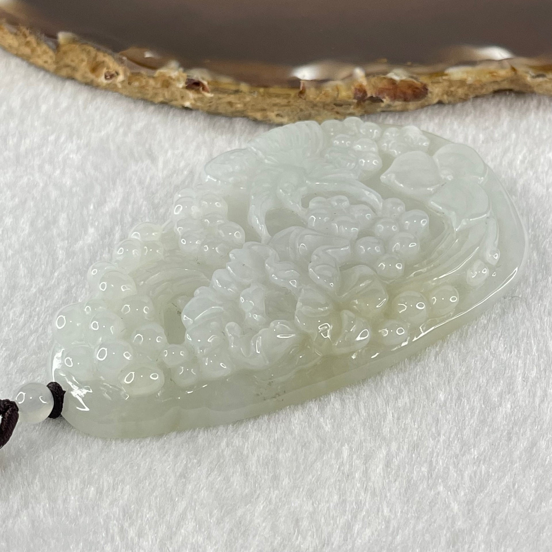 Type A Faint Green Lavender with Faint Yellow Patch Jadeite Bird with Flowers Pendant 79.61g 78.7 by 47.1 by 12.2mm - Huangs Jadeite and Jewelry Pte Ltd