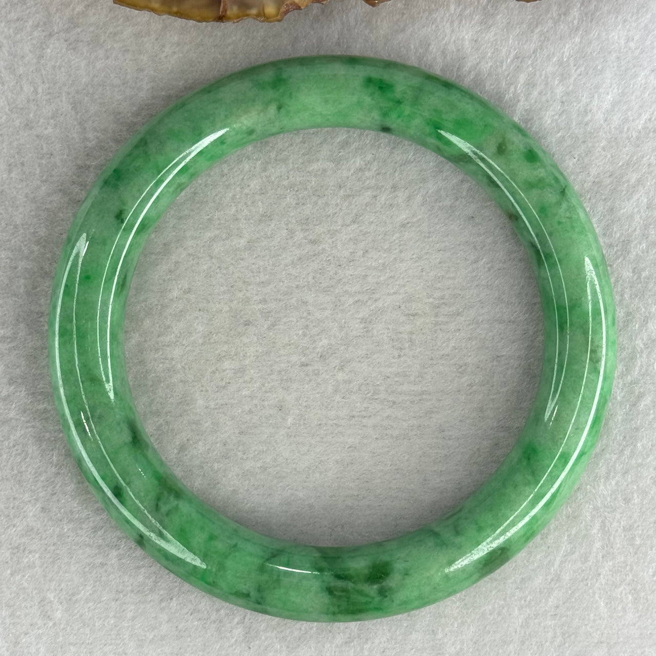 Type A Apple Green Jade Jadeite Bangle 60.77g Inner Diameter: 59.2mm Thickness: 10.2 by 10.4mm (Very Very Slight Internal Lines) - Huangs Jadeite and Jewelry Pte Ltd