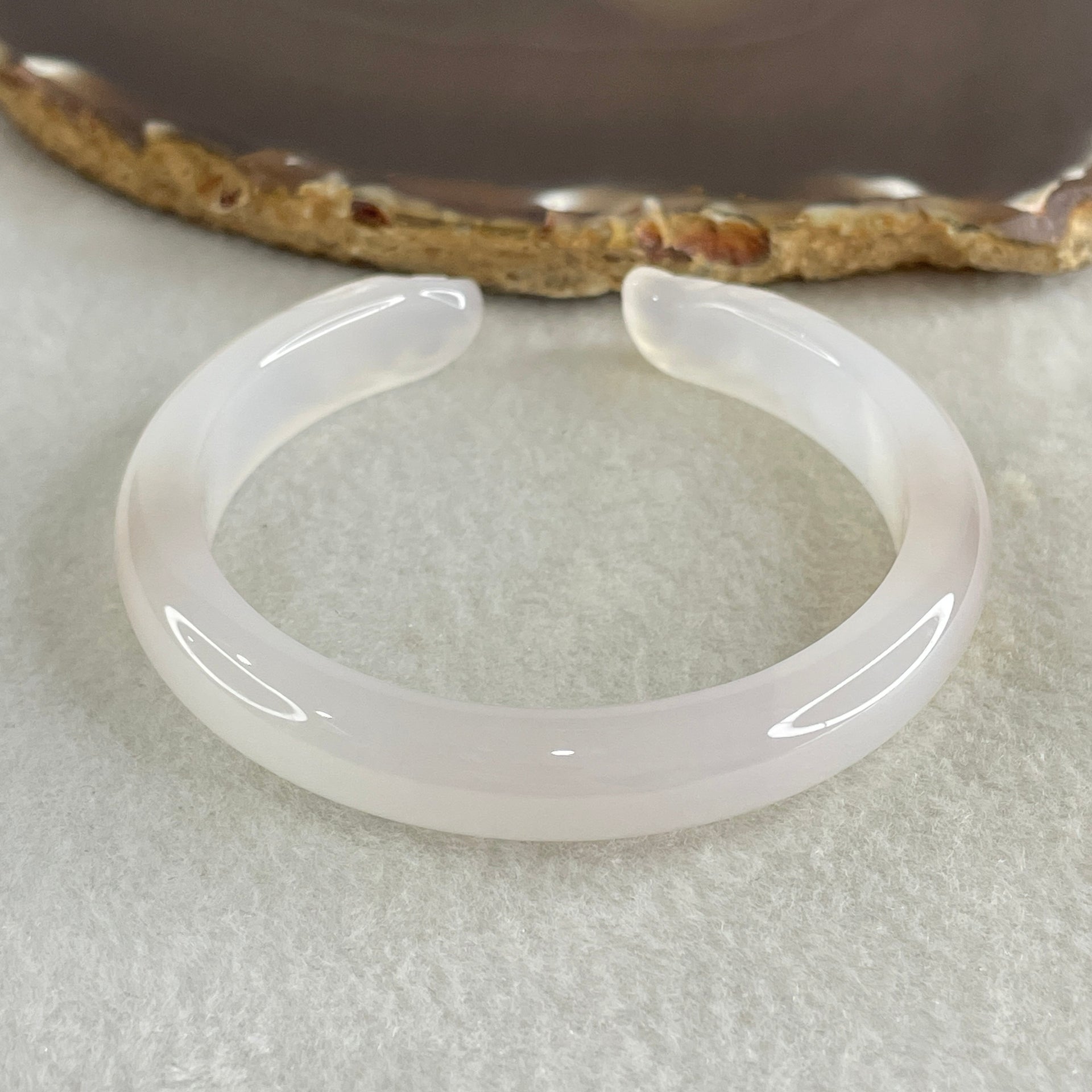 Natural Pinky Agate Fox Bange Internal Dimeter 56.4mm 27.67g 10.2 by 6.9mm - Huangs Jadeite and Jewelry Pte Ltd