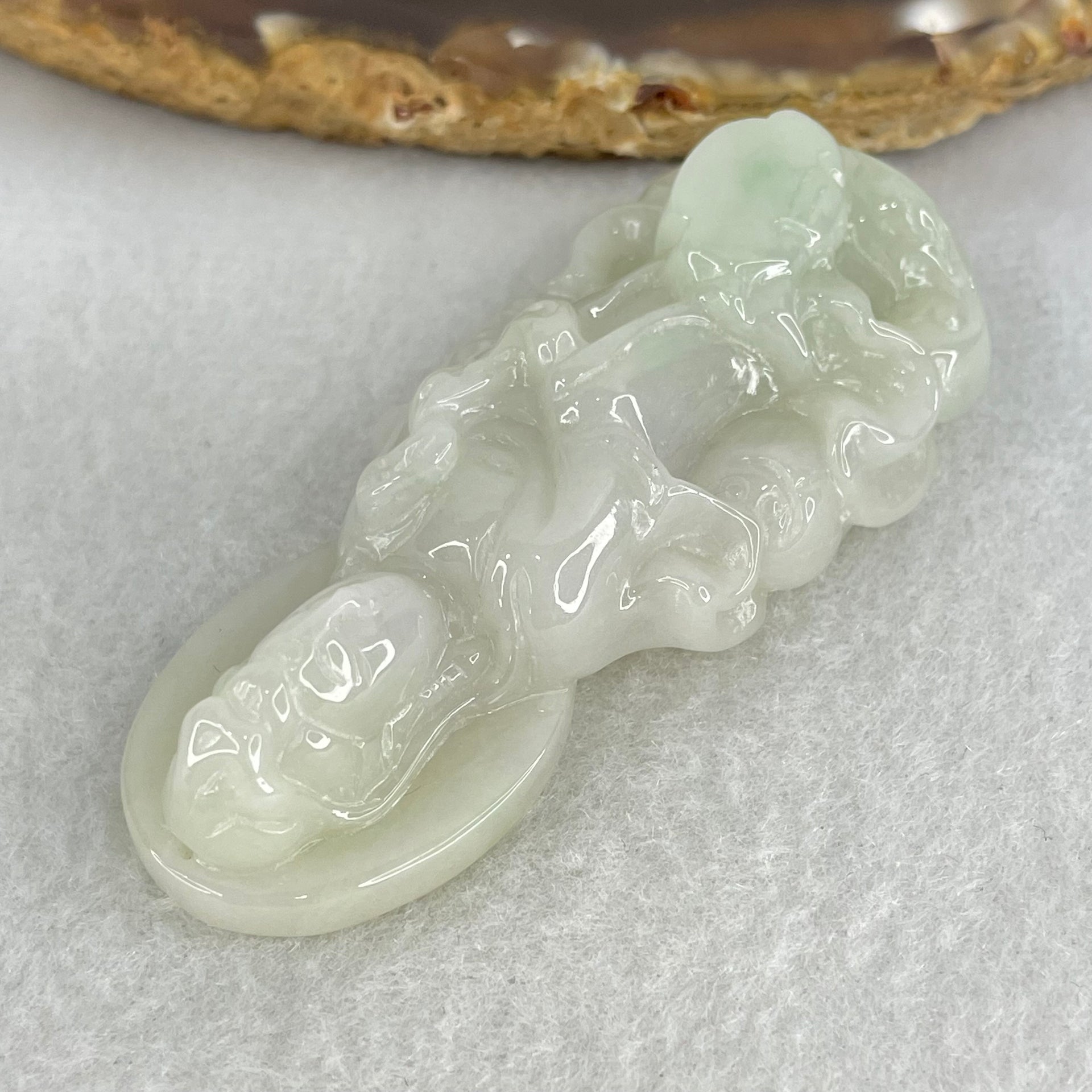 Type A Faint Green Lavender Jadeite Guan Yin Pendant 37.10g 61.8 by 28.3 by 14.3mm - Huangs Jadeite and Jewelry Pte Ltd