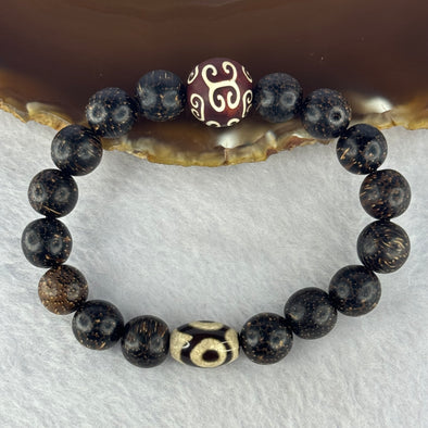 Natural Agarwood With 3 Eyes Dzi Bead Tian Zhu Beads Bracelet 天然沉香带三眼天珠手链 17.56g 16.5cm Dzi 14.4 by 9.8 and 14.1mm 1 Bead and 10.8mm 16 Beads - Huangs Jadeite and Jewelry Pte Ltd
