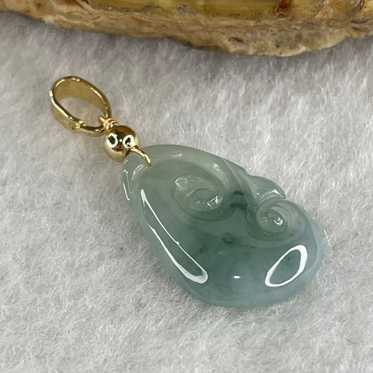 Type A Semi Icy Blueish with Light Green Piao Hua Jadeite Ruyi Pendant 1.26g 17.6 by 11.8 by 3.3mm - Huangs Jadeite and Jewelry Pte Ltd