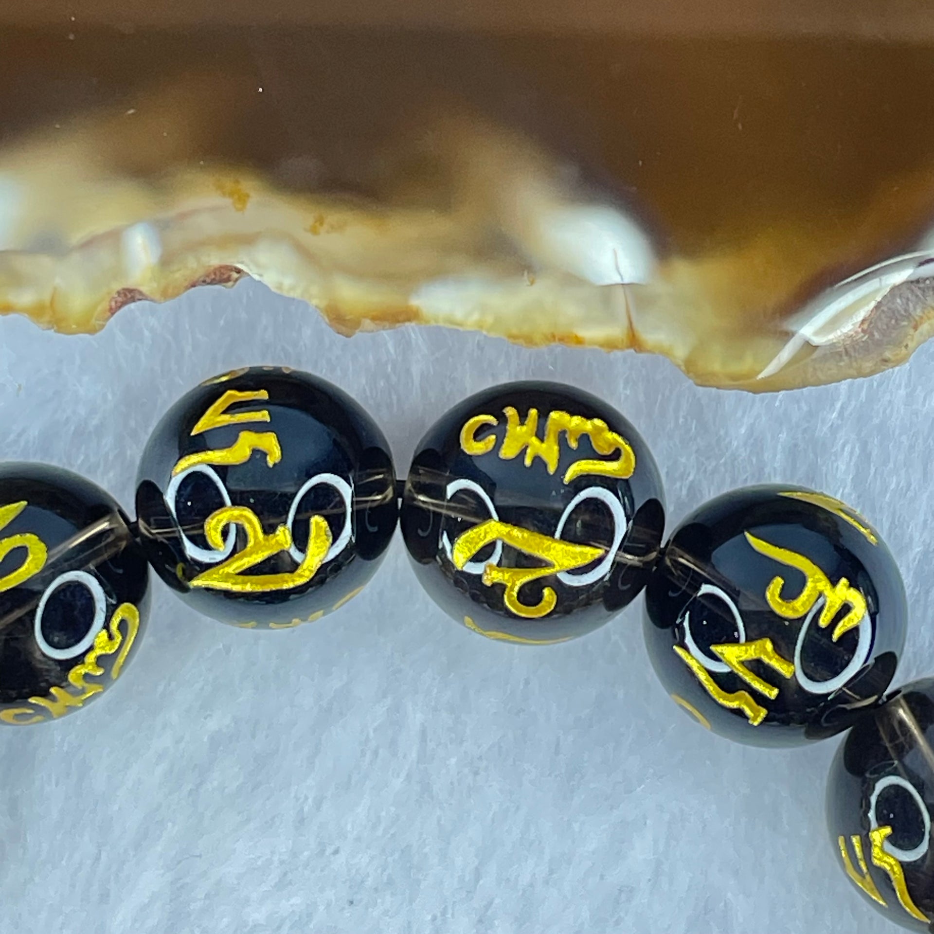 Natural Smoky Quartz Om Mani Padme Hum Beads Bracelet with Black Onyx 3 Legged Toad Charm 24.5 by 27.4 by 20.2mm 67.40g 19cm 14.1mm 14 Beads - Huangs Jadeite and Jewelry Pte Ltd