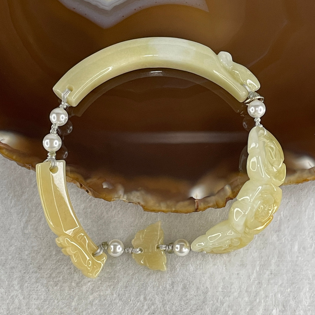 Natural Type A Light Yellowish with Light Green Jadeite Flowers with Dragon Head and Butterfly Bracelet 25.67g 7.2 by 8.4mm - Flower 40.4 by 16.5 by 6.1mm - Huangs Jadeite and Jewelry Pte Ltd