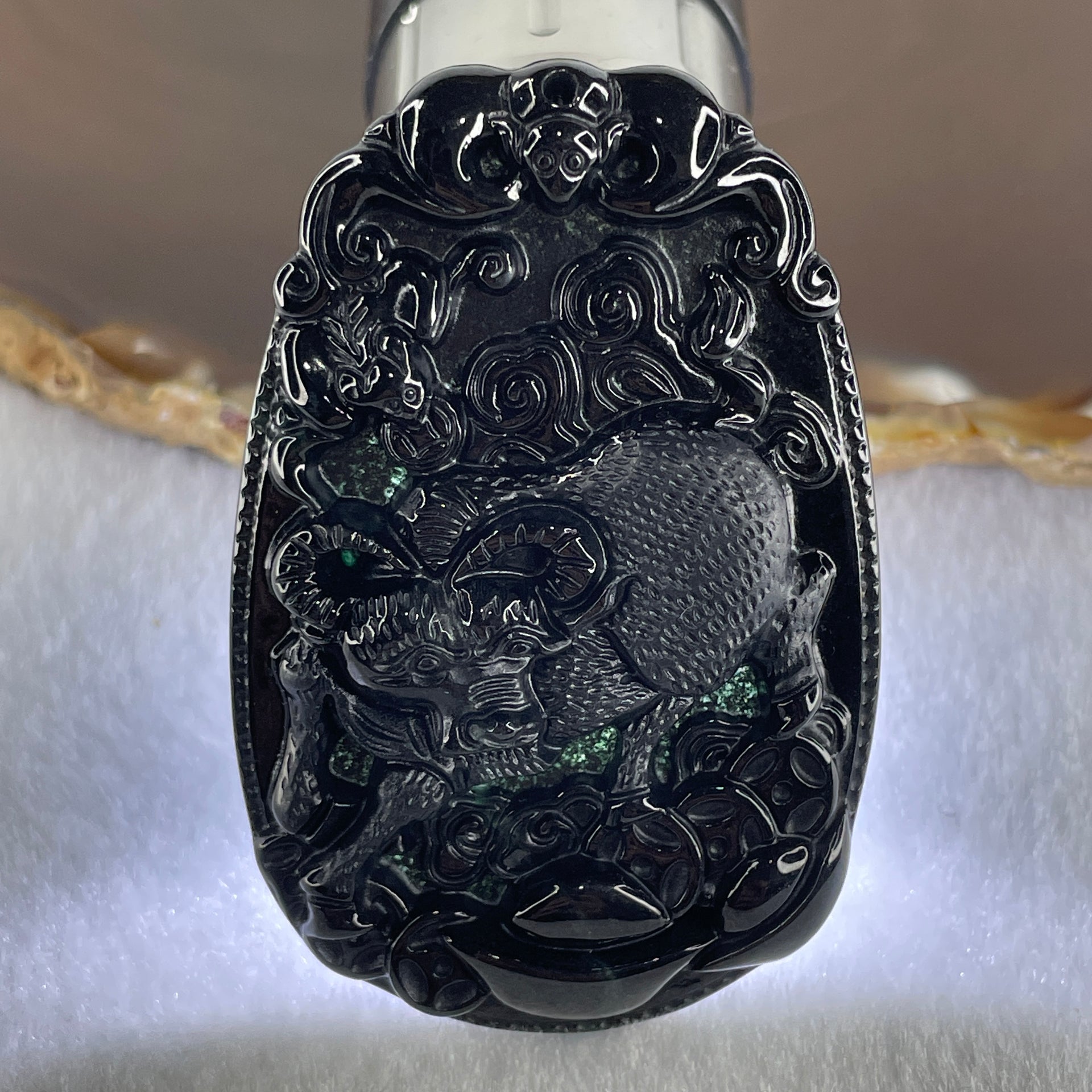 Type A Opaque to Partial Translucent Black Omphacite Jadeite Ox Pendant 20.24g 59.5 by 39.4 by 7.6mm - Huangs Jadeite and Jewelry Pte Ltd