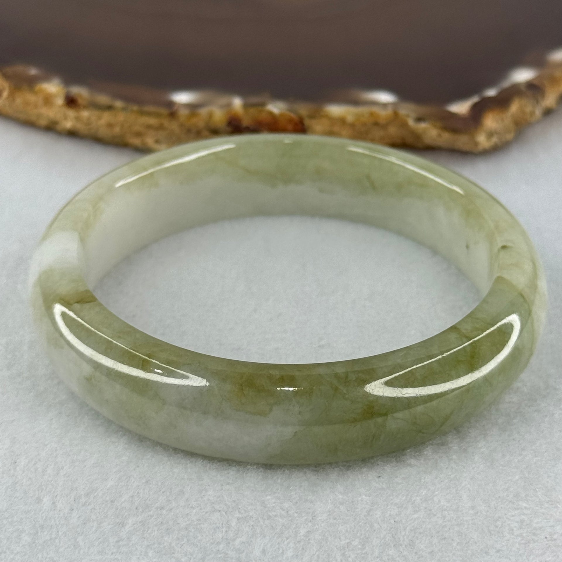 Type A Green Patches with Faint Pinkish Lavender Jadeite Bangle Internal Diameter 56.6mm 59.85g 14.1 by 8.4mm (External Lines) - Huangs Jadeite and Jewelry Pte Ltd