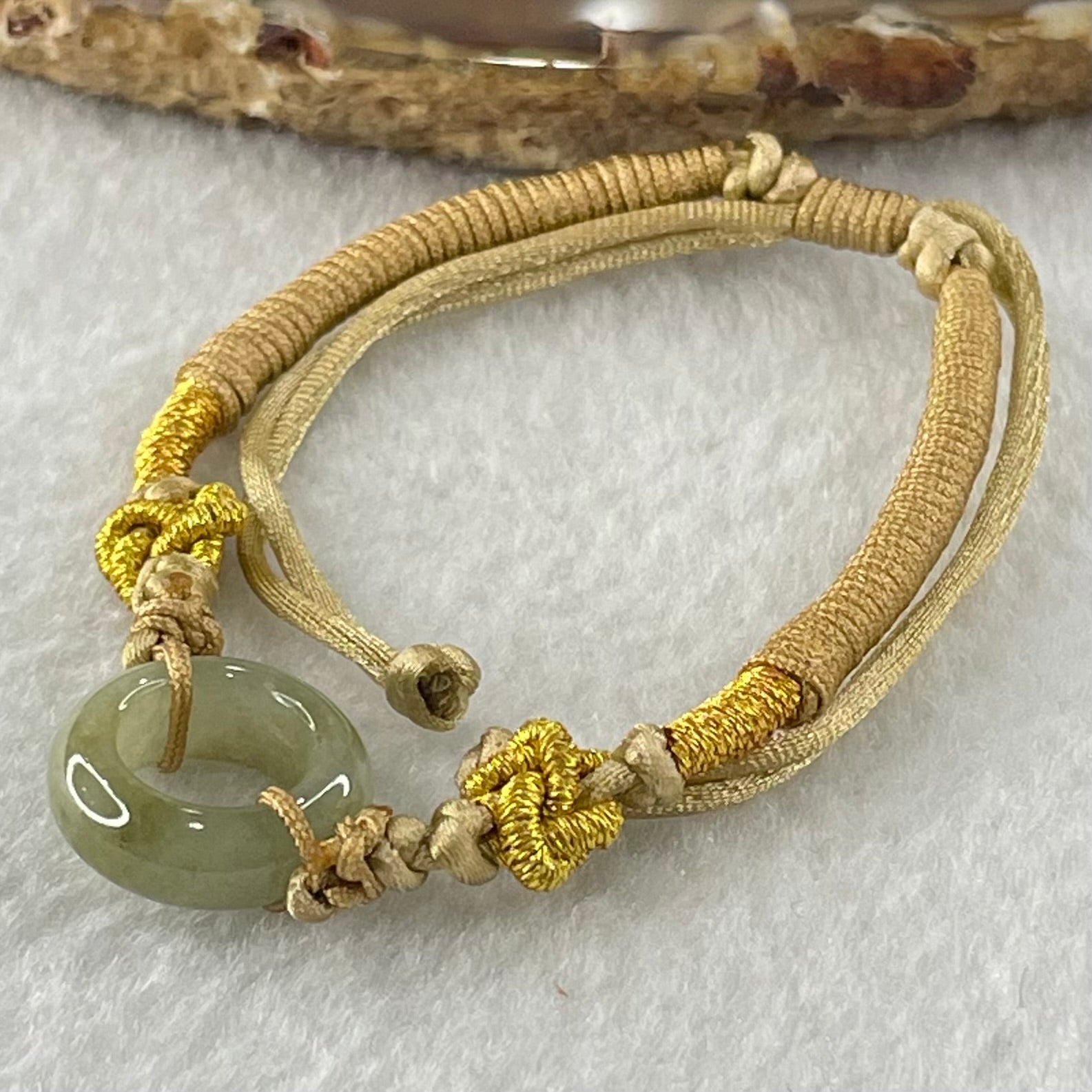 Type A Blueish Green with Brown Jadeite Ping An Kou String Bracelet 2.98g 15.2 by 5.7mm - Huangs Jadeite and Jewelry Pte Ltd