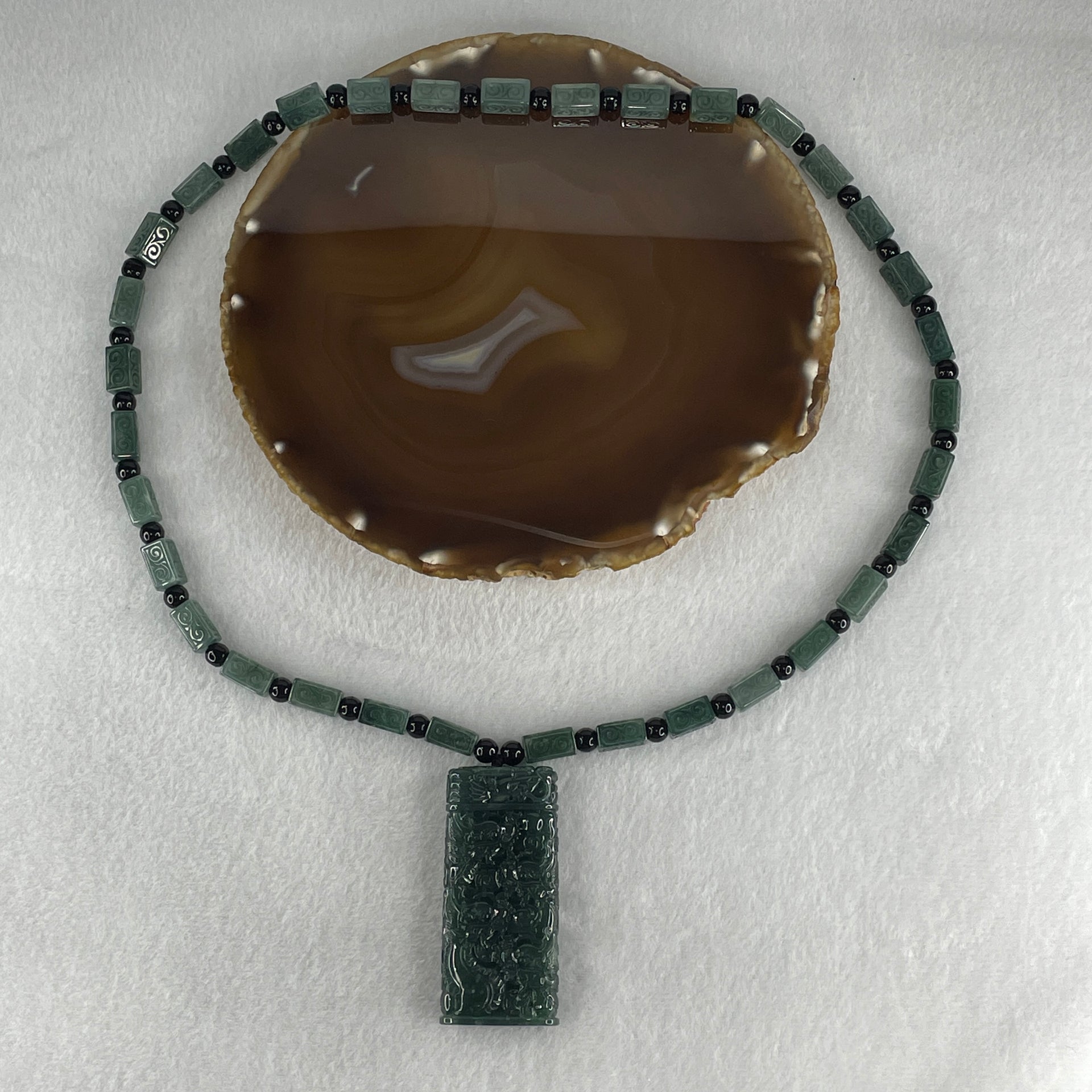 Type A Jelly Blueish Green Jadeite 9 Dragon Double Side Pendant 121.51g 62.8 by 28.9 by 11.5mm - Huangs Jadeite and Jewelry Pte Ltd