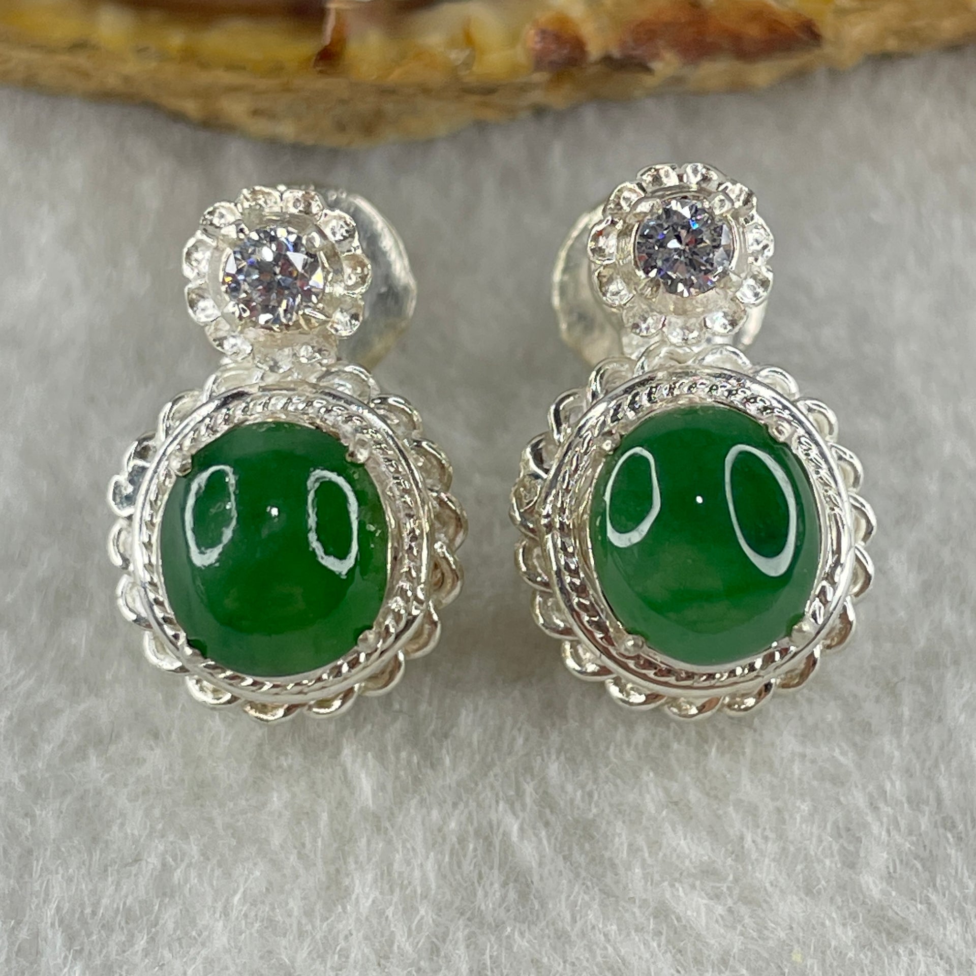 Type A Natural Full Old Mine Spicy Green Jadeite Cabochon 9.2 by 8.1 by 3.5mm Stone for Setting 31.90g (On Silver Earrings Mold) - Huangs Jadeite and Jewelry Pte Ltd