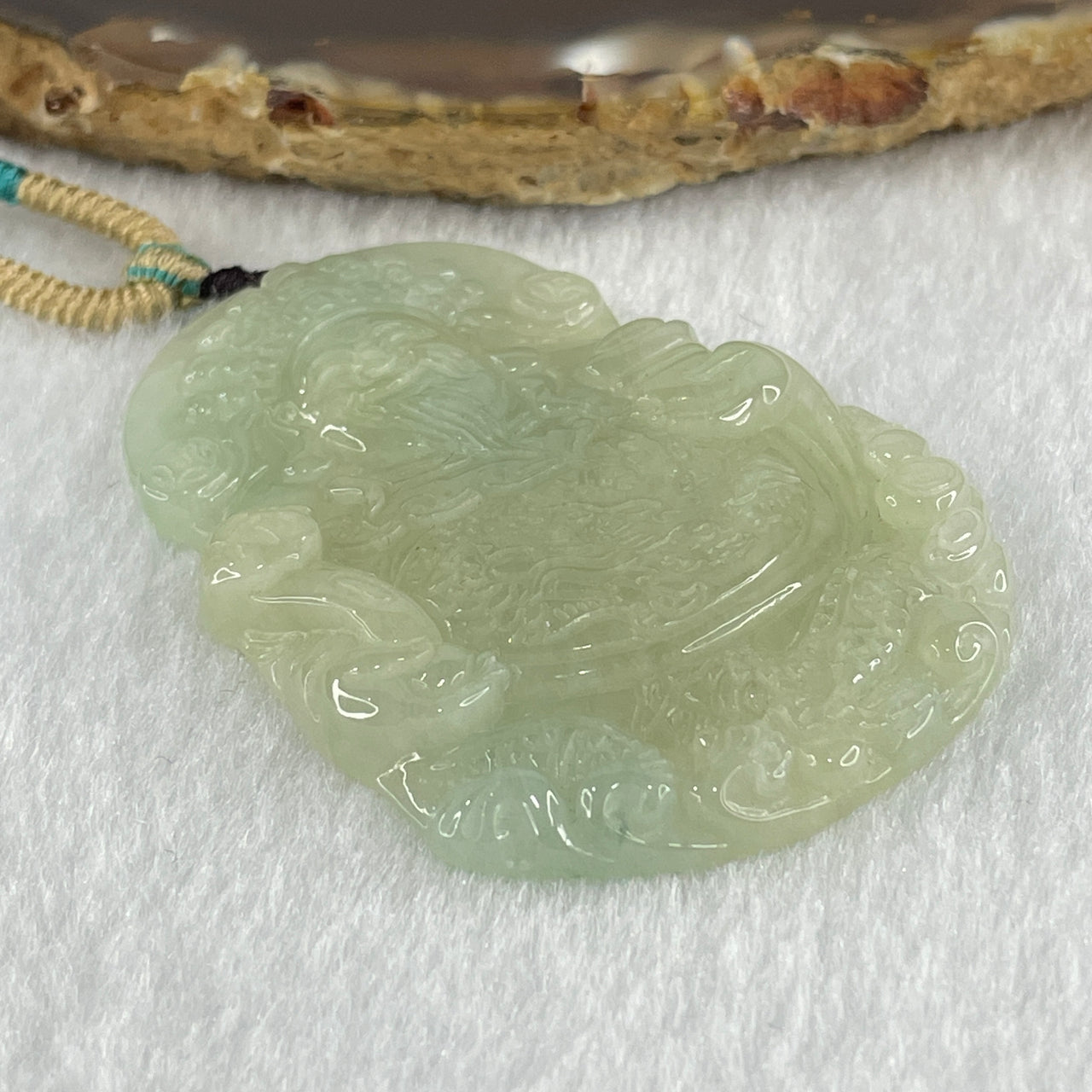 Type A Light Green Jadeite Cai Shen Ye God Of Fortune Pendant 22.73g 53.5 by 39.7 by 5.4mm