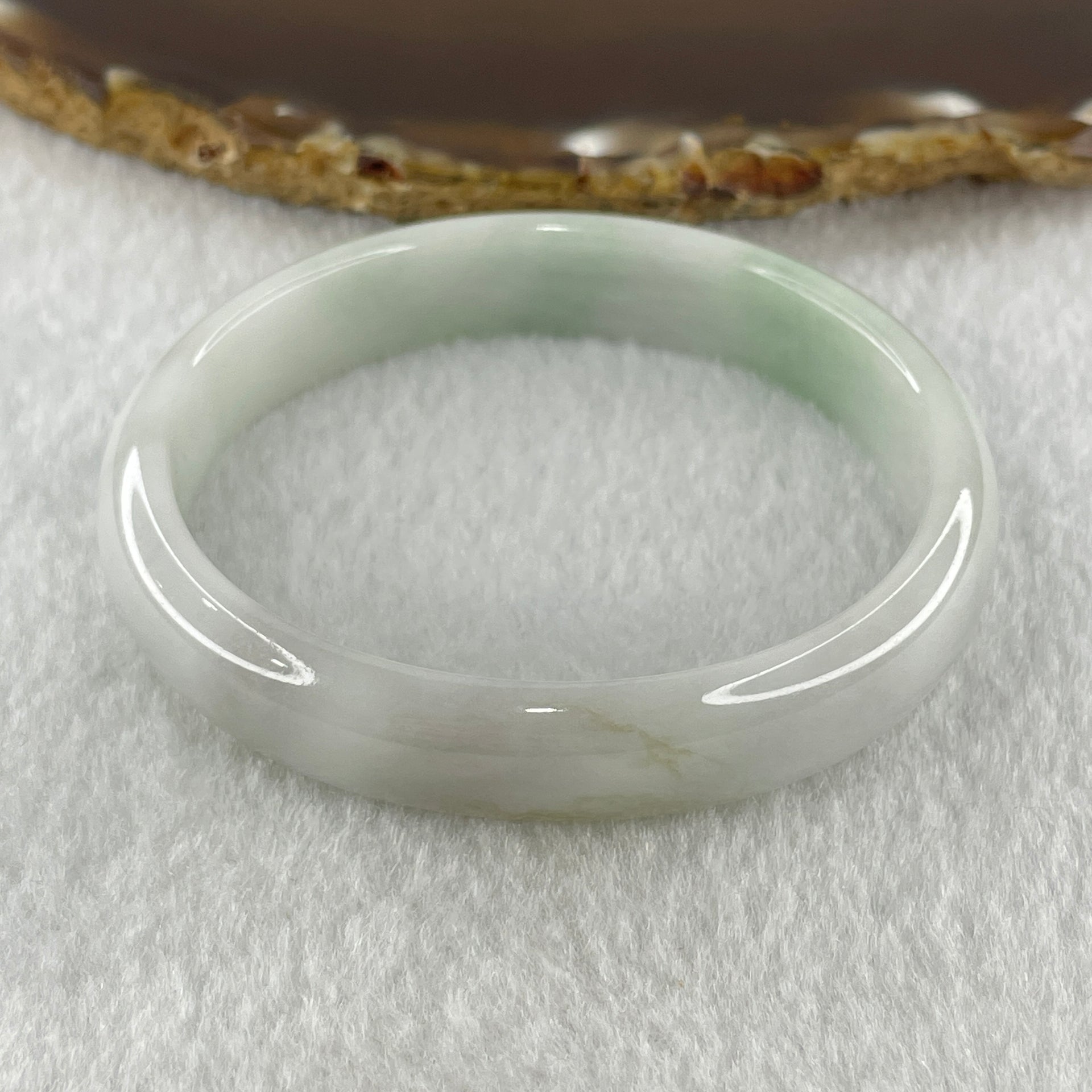 Natural Type A Faint Green Faint Lavender Jadeite Oval Bangle 33.20g Inner Diameter 54.9mm 11.7 by 6.3mm (Very Very Slight Internal Lines) - Huangs Jadeite and Jewelry Pte Ltd