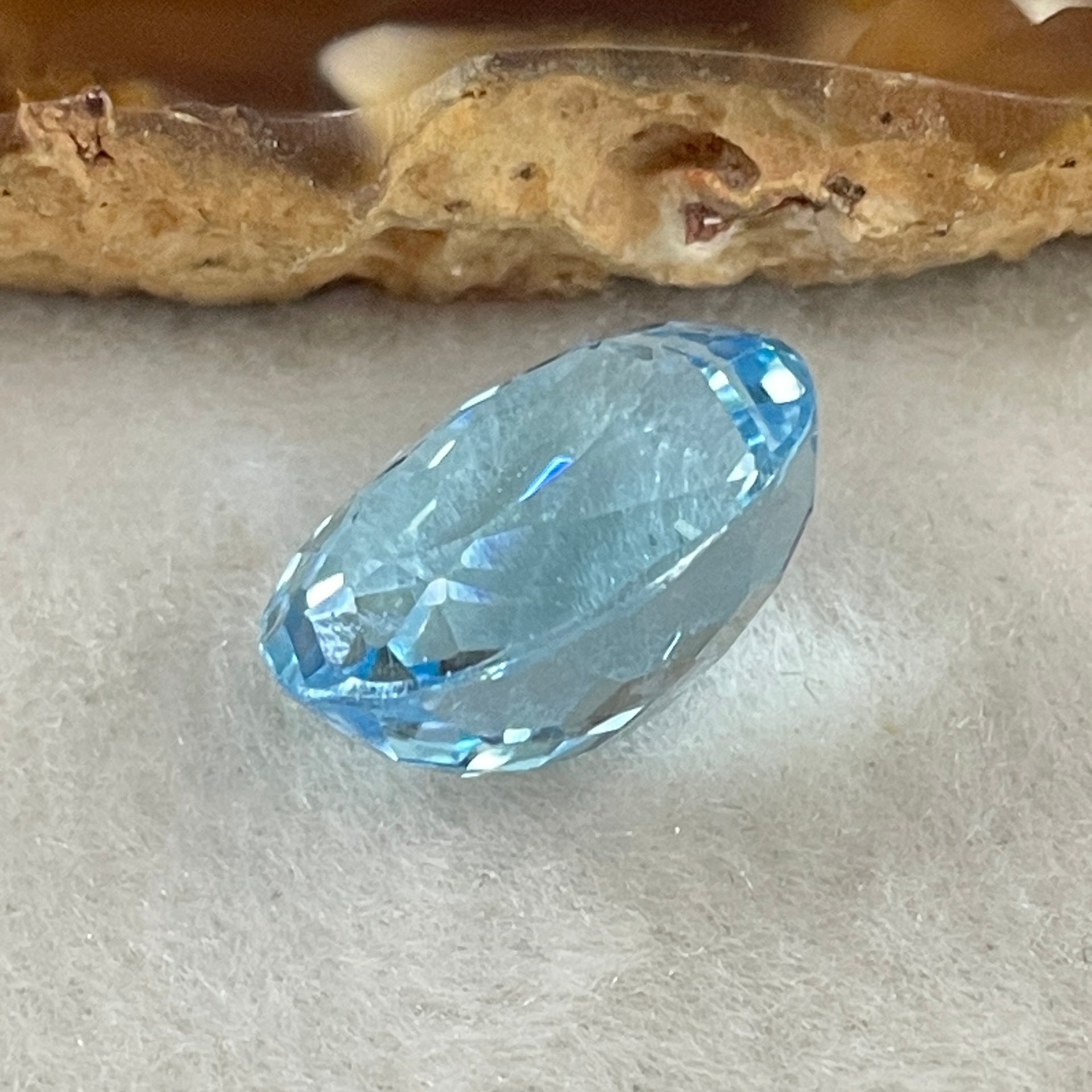 Natural Sky Blue Topaz Oval Shape 12.31ct 14.7 by 11.8 by 8.1mm - Huangs Jadeite and Jewelry Pte Ltd