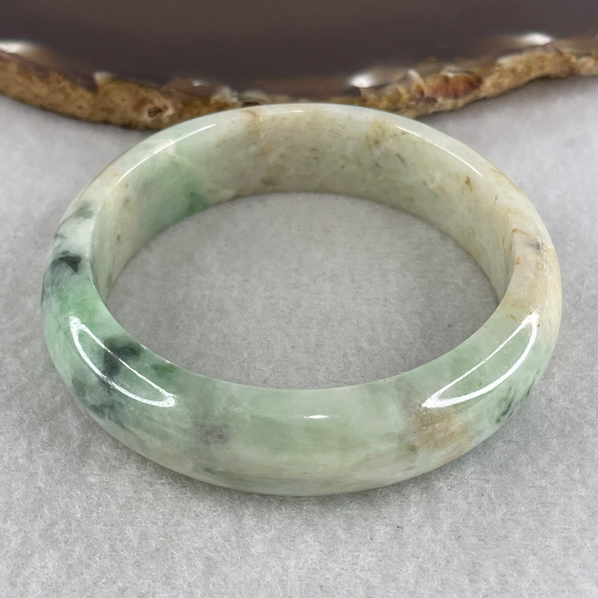 Natural Type Green with Reddish Brown Piao Hua Jadeite Bangle 62.49g Inner Diameter 55.5mm 15.4 by 8.0mm (Slight Internal Line) - Huangs Jadeite and Jewelry Pte Ltd