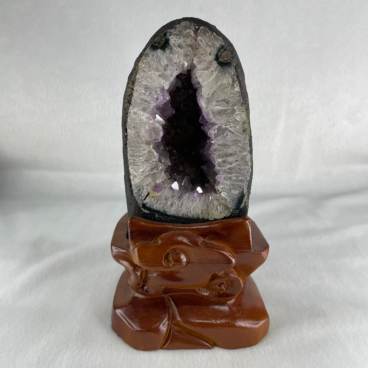 Natural Amethyst Cave with Wooden Stand 1,198.8g 98.0 by 99.0 by 175.0mm - Huangs Jadeite and Jewelry Pte Ltd