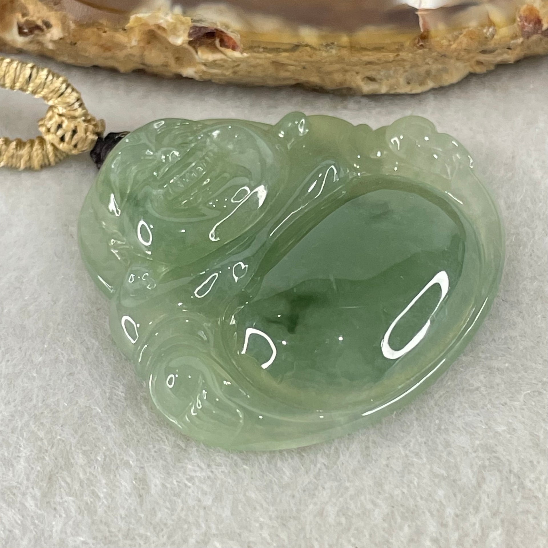 Type A Icy Green with Blueish Green Piao Hua Floral Jadeite Milo Buddha Pendant 13.81g 33.8 by 36.3 by 6.5mm - Huangs Jadeite and Jewelry Pte Ltd