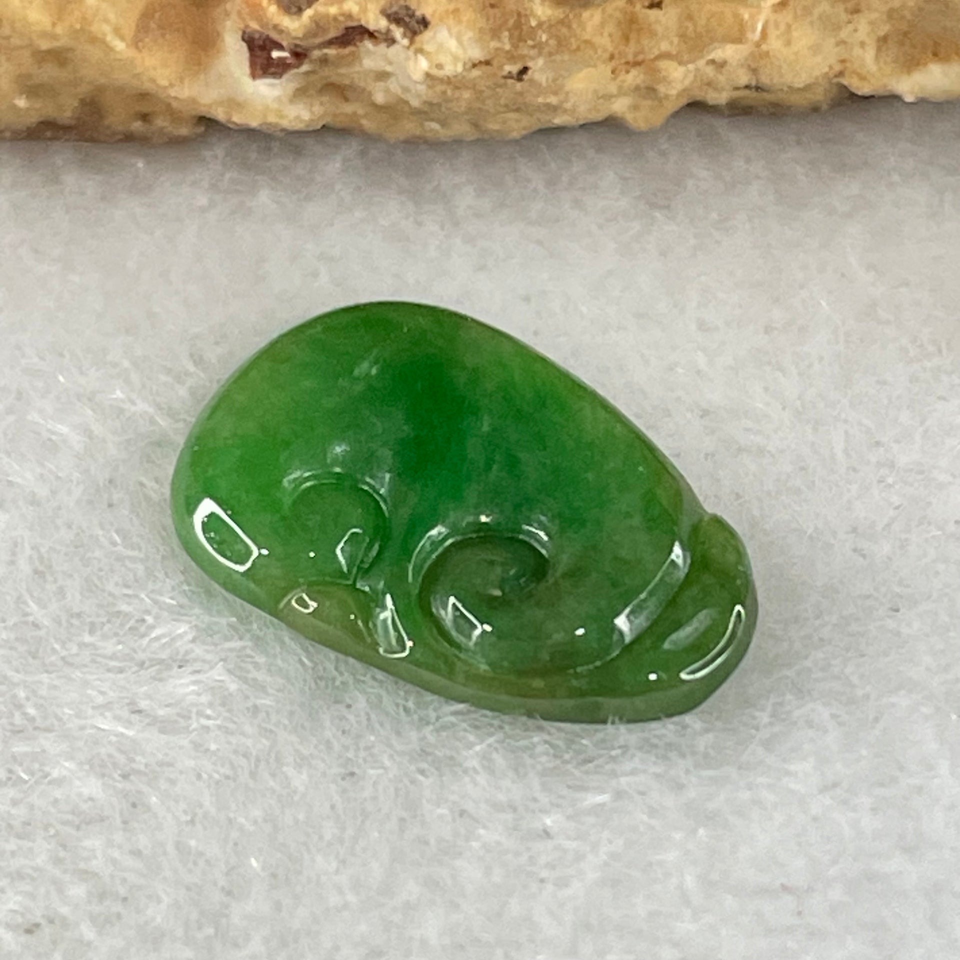 Type A Old Mine Spicy Green Jadeite Ruyi Charm Stone For Setting 0.41g 13.8 by 8.8 by 1.6mm - Huangs Jadeite and Jewelry Pte Ltd