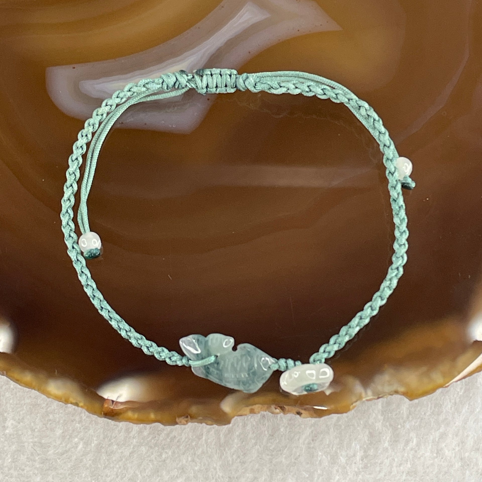 Natural Type A Semi Icy Green with Dark Green Patches Jadeite Fish with Flower on String Bracelet 1.59g 15-18cm 15.6 by 7.9 by 3.5mm - Huangs Jadeite and Jewelry Pte Ltd