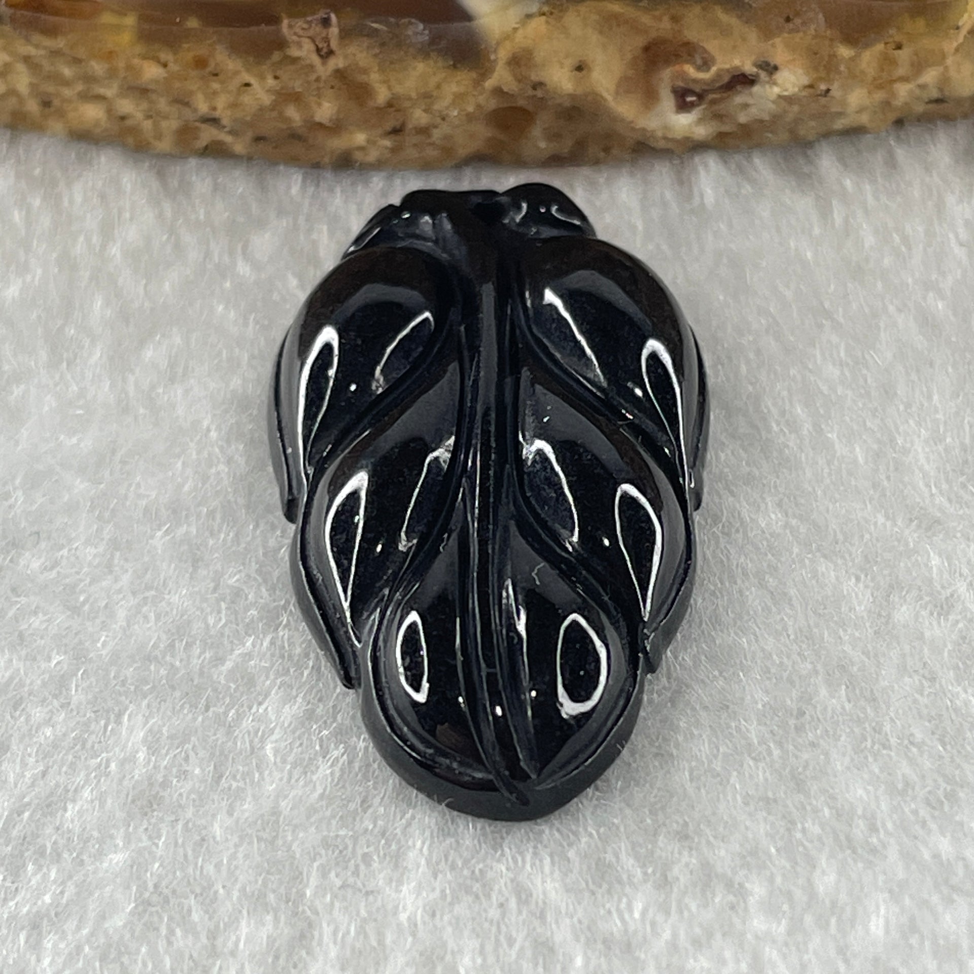 Type A Opaque Black Omphacite Leaf Pendant Charm 5.60g 31.5 by 18.0 by 5.7mm - Huangs Jadeite and Jewelry Pte Ltd