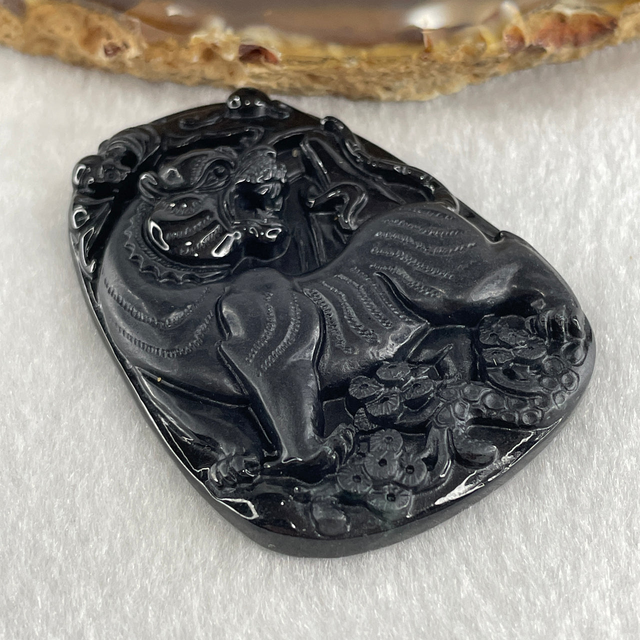 Type A Opaque to Partial Translucent Black Omphacite Jadeite Tiger Pendant 24.24g 56.8 by 40.5 by 7.5mm - Huangs Jadeite and Jewelry Pte Ltd